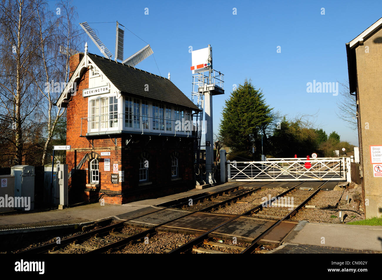 Heckington Village Lincolnshire England.Signal Box and Train Station.With Windmill. Stock Photo