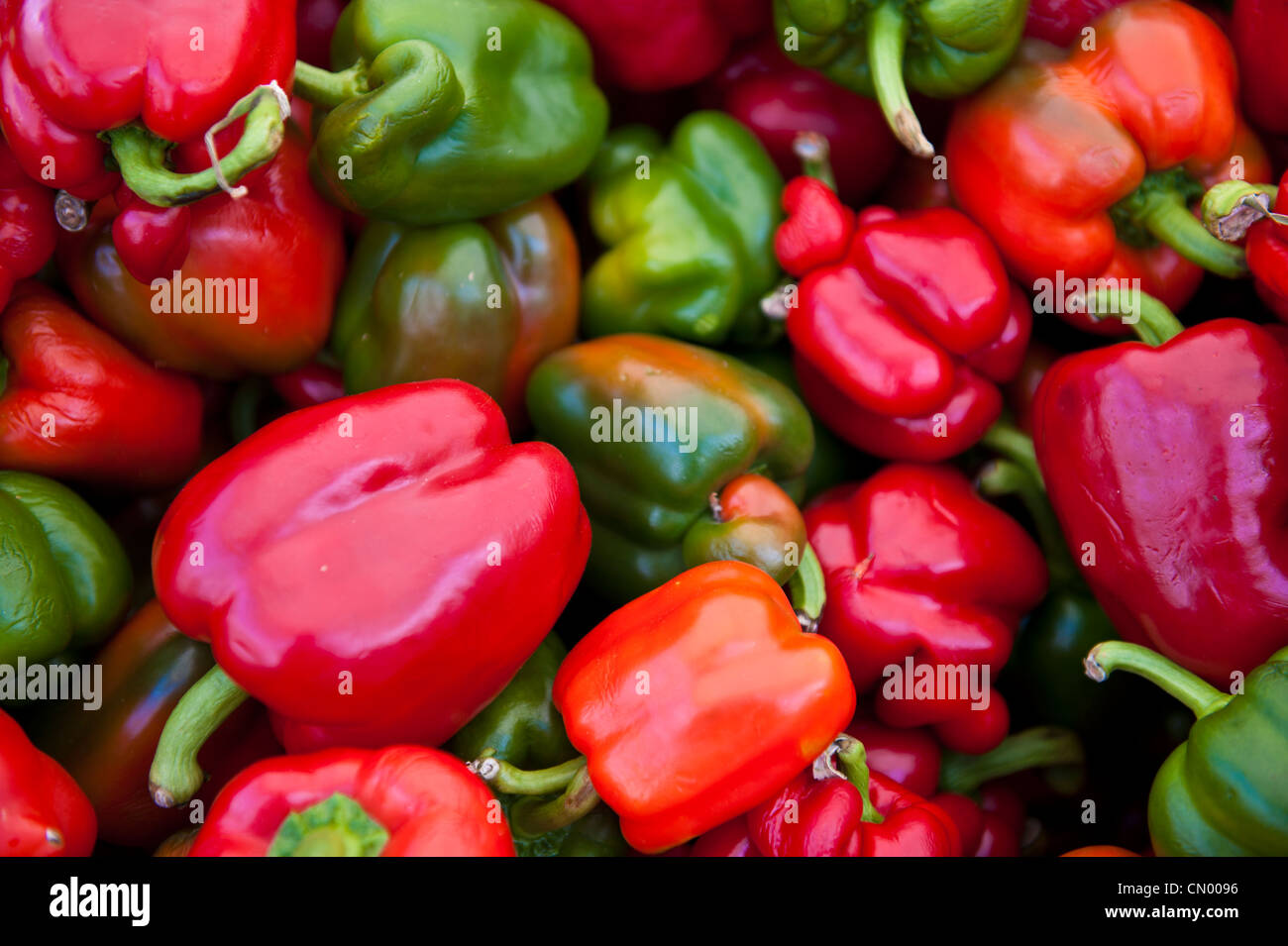A bunch of red and green peppers Stock Photo - Alamy