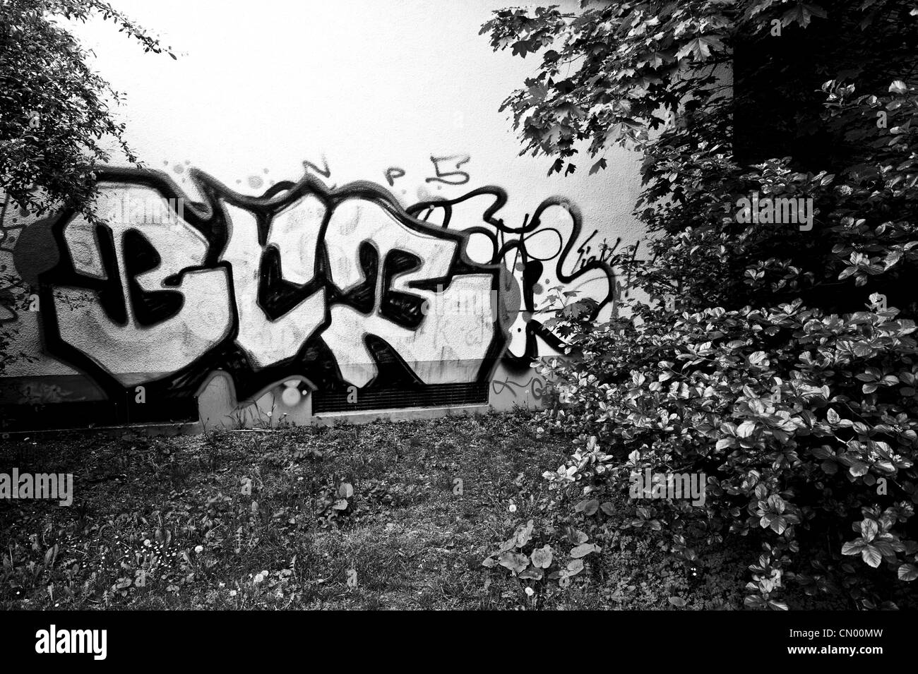 A black and white image of graffiti. Stock Photo