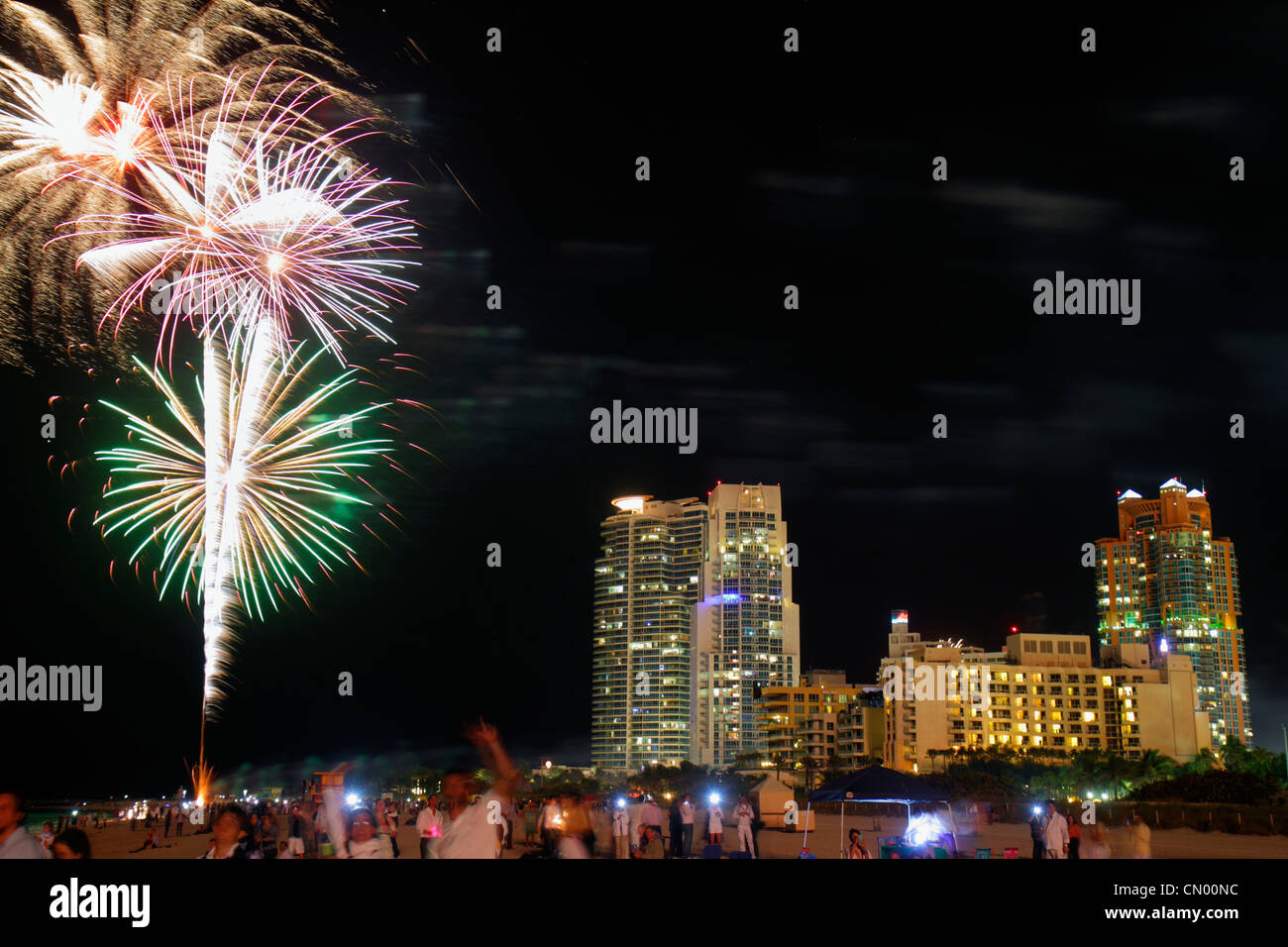Miami Beach Florida,public beach,night,Portofino,Continuum,high rise,condominiums,Marriot,hotel,New Year's Eve,fireworks tradition,FL120101152 Stock Photo