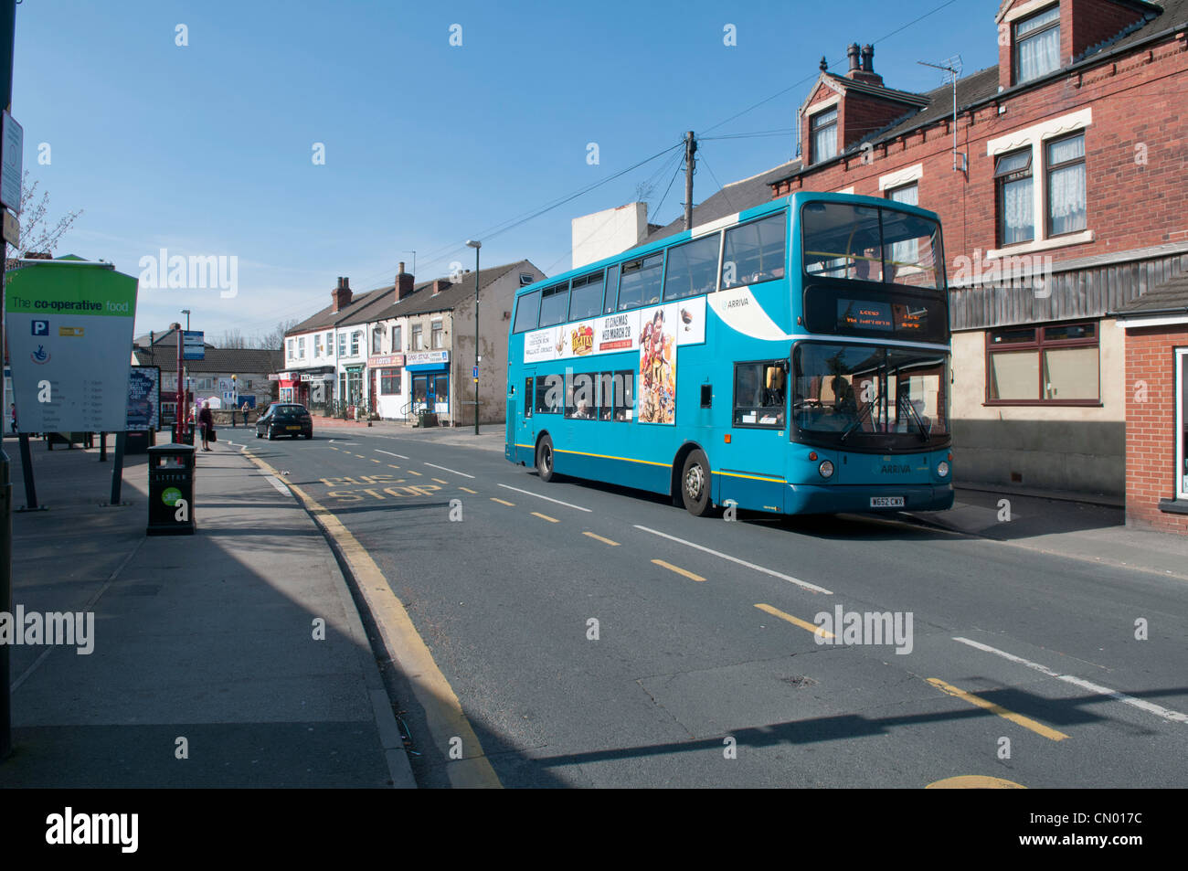 Arriva bus at bus stop, High Street, Kippax Stock Photo