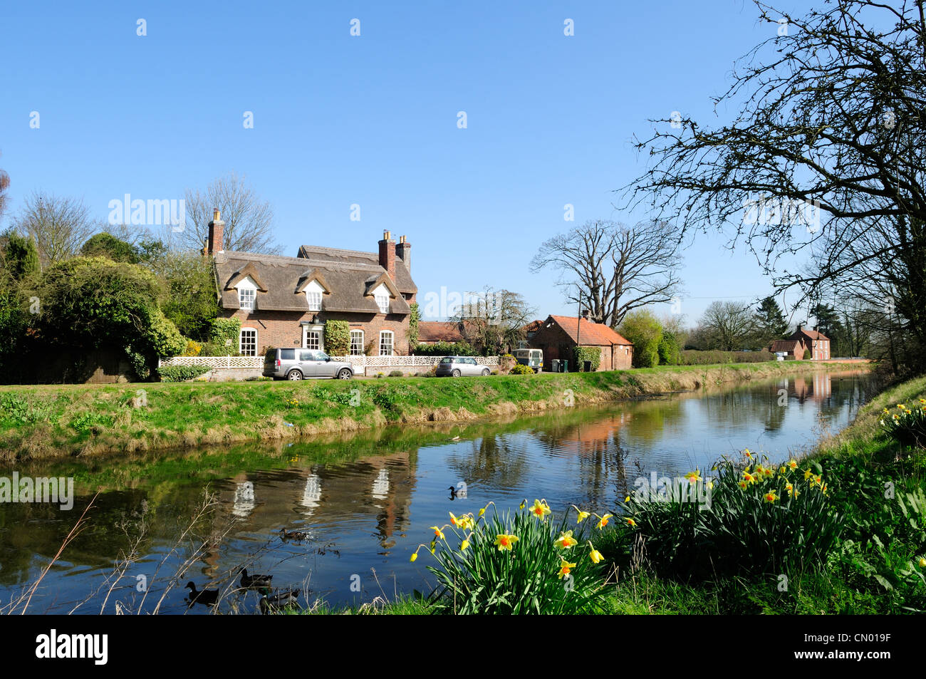 Wainfleet Lincolnshire England.River Steeping and Thatched Cottage