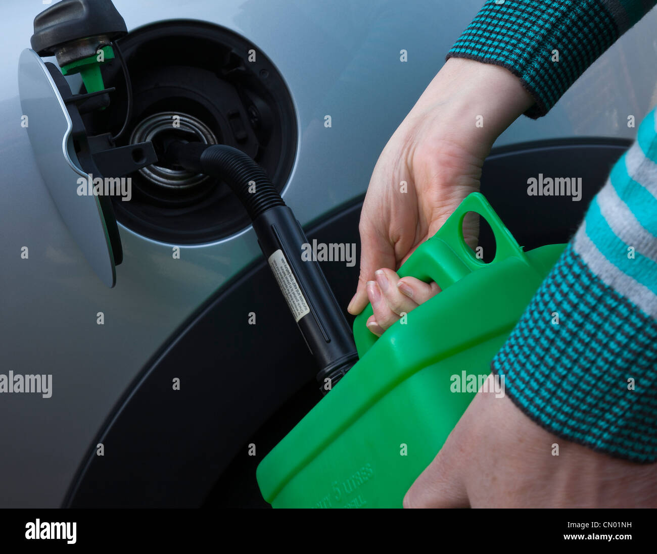 Pouring petrol can hires stock photography and images Alamy