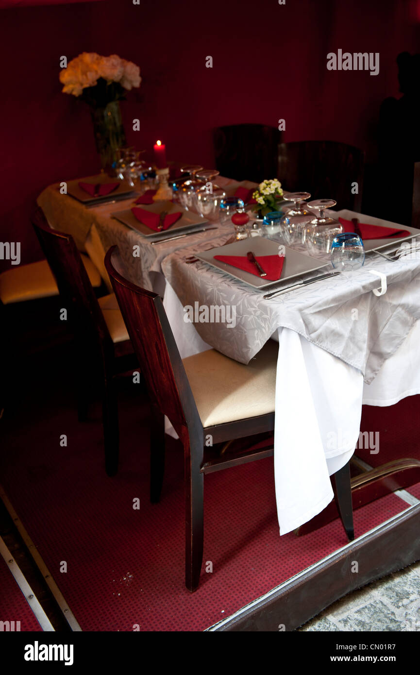 A dim lit, romantic dining area. Stock Photo