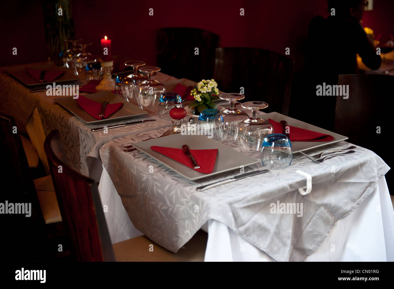 A table setup for a romantic couples dinner. Stock Photo