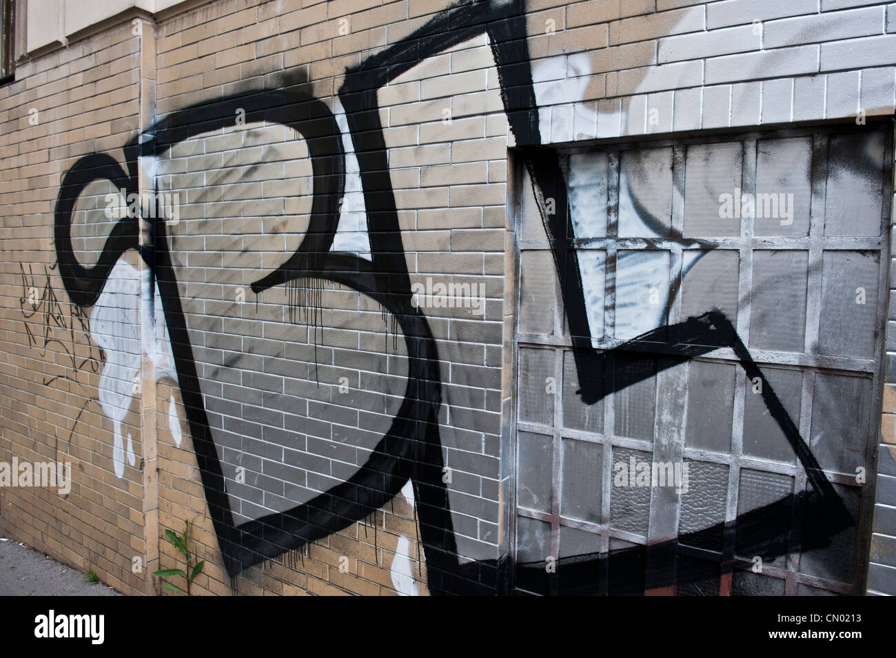 A closeup of private property tagged with the letters 'BL,' outlined in blacked. Stock Photo