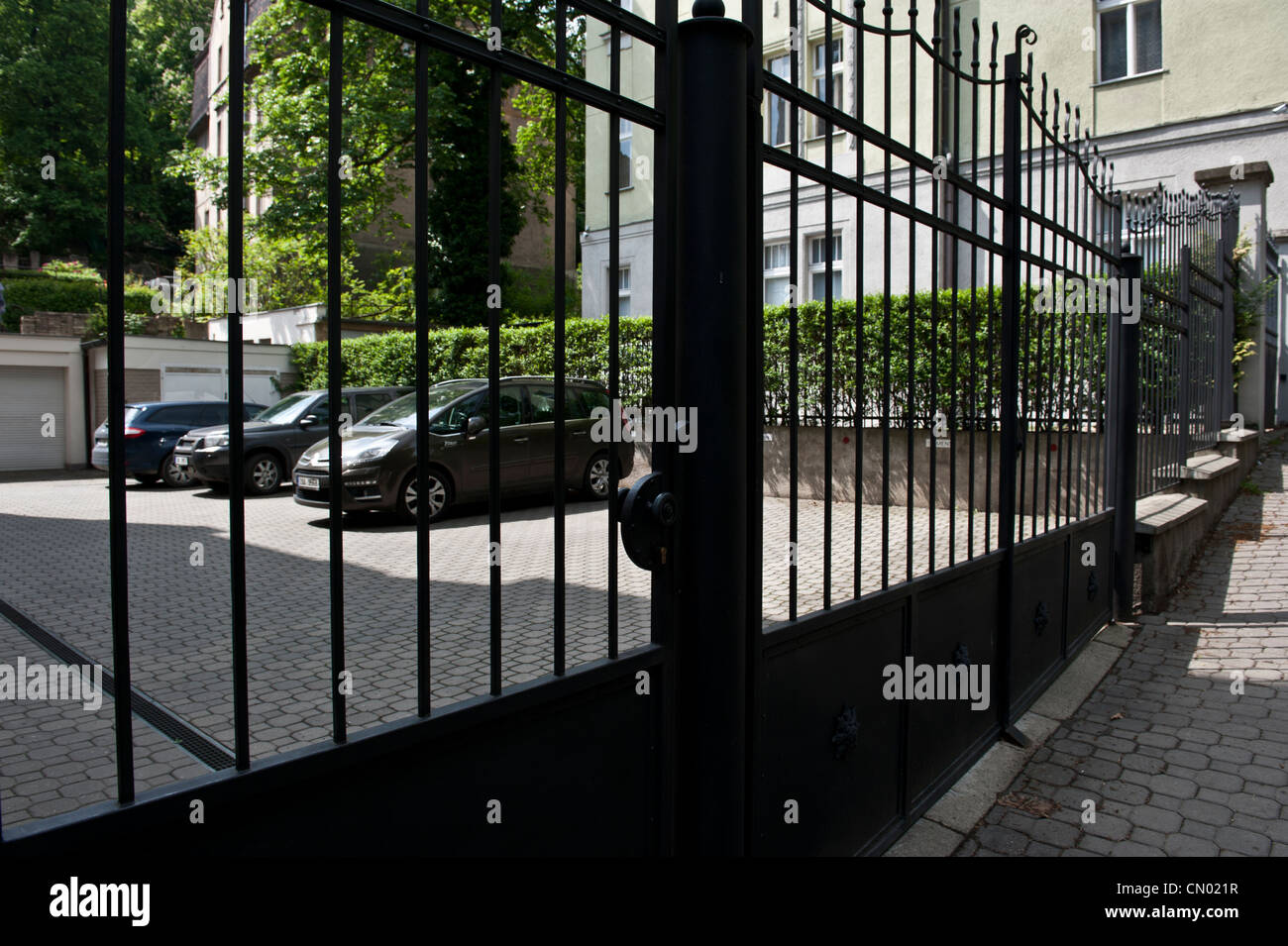 A gated parking lot outside of a private residential area. Stock Photo