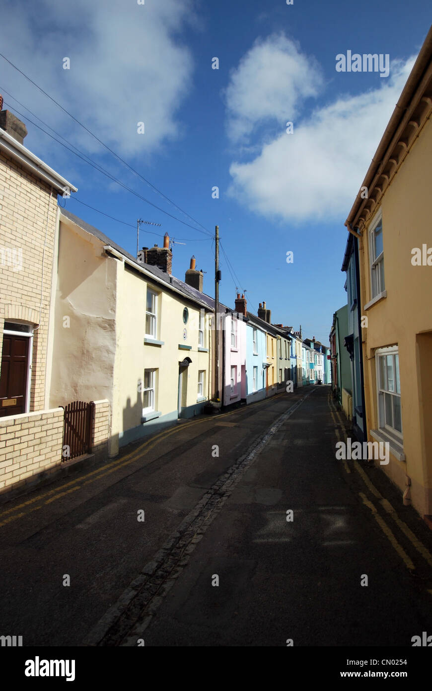 A row of different coloured houses in the village of Appledore, North