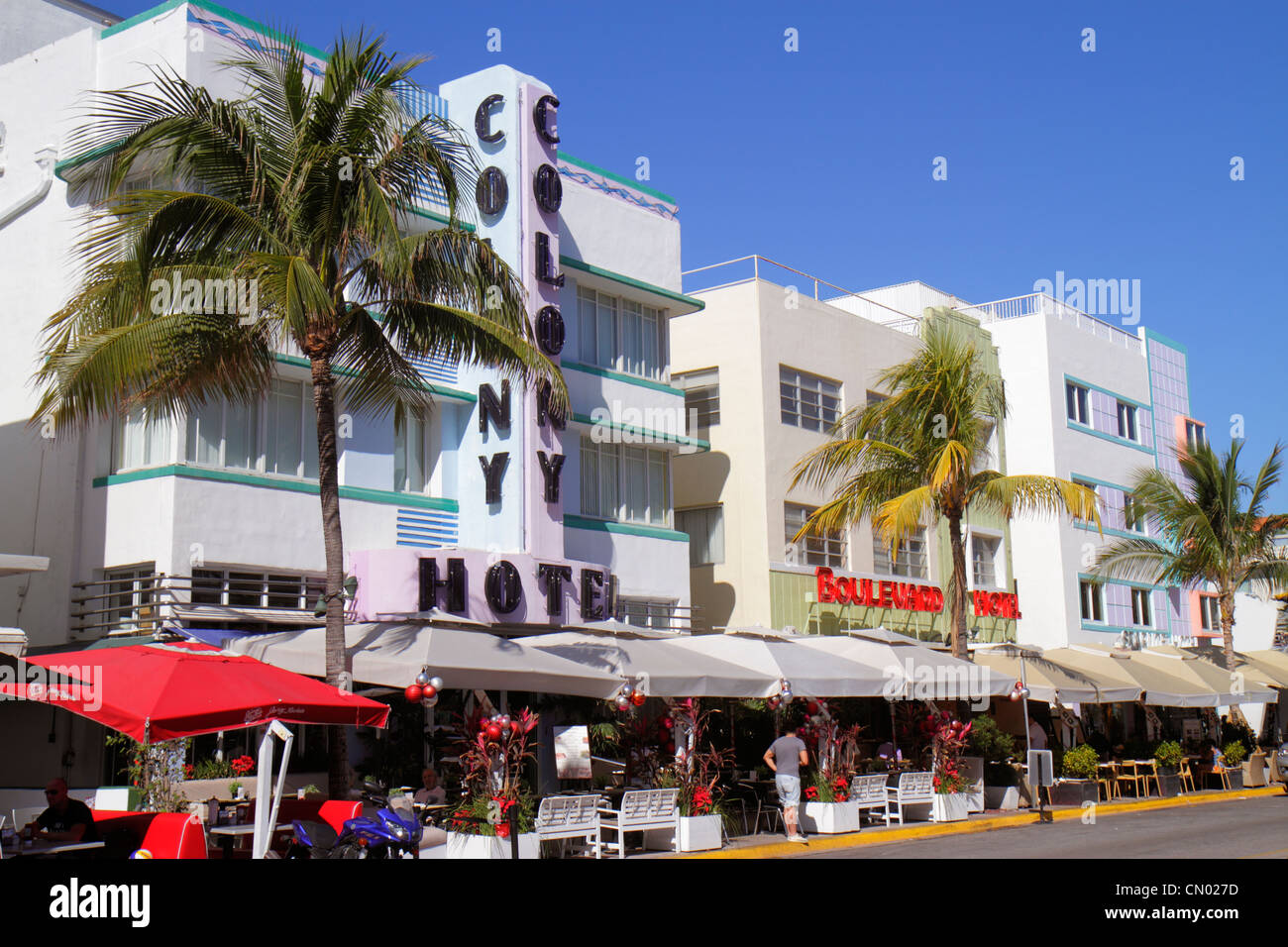Miami Beach Florida,Ocean Drive,Art Deco Historic District,Colony,Boulevard,hotel,umbrellas,al fresco sidewalk outside tables,dining,restaurant restau Stock Photo