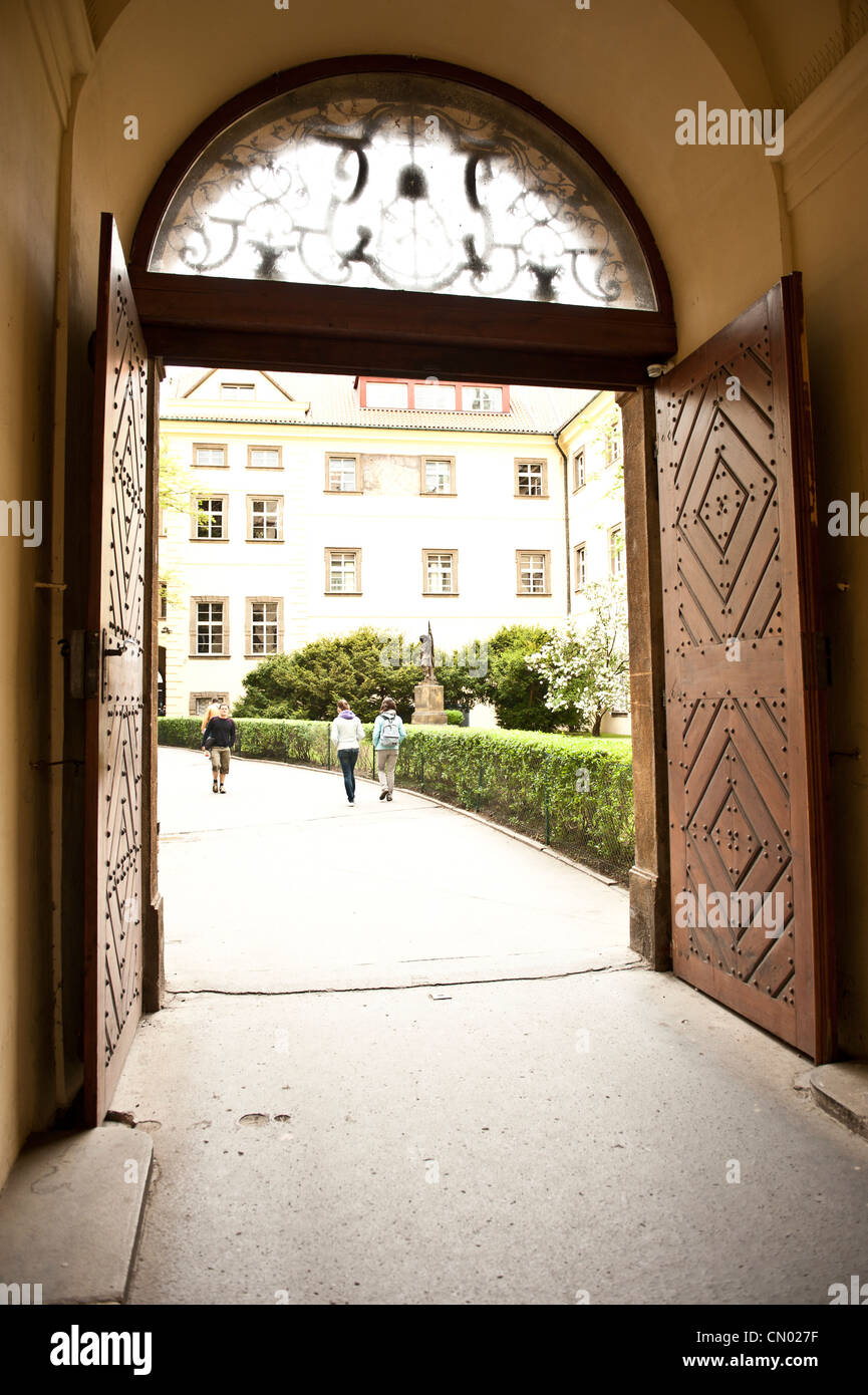 A long shot of people walking outside of an underground walkway. Stock Photo