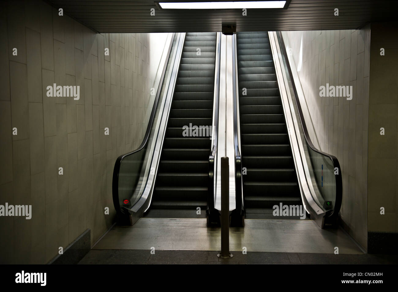 POV shot going up escalator. Stock Photo