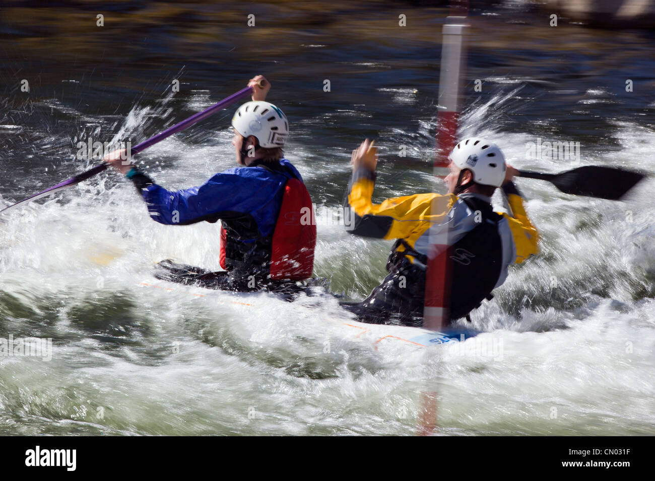 Tandem whitewater kayak slalom racers, Arkansas River, Salida, Colorado, USA Stock Photo