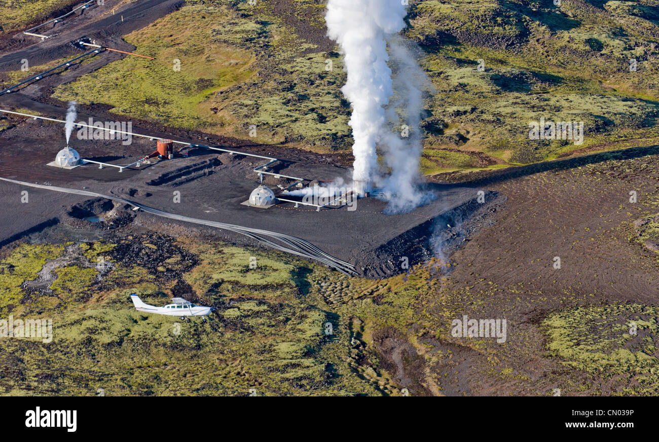 Cessna flying by The Hellisheidi Geothermal Power Plant, Iceland Stock ...