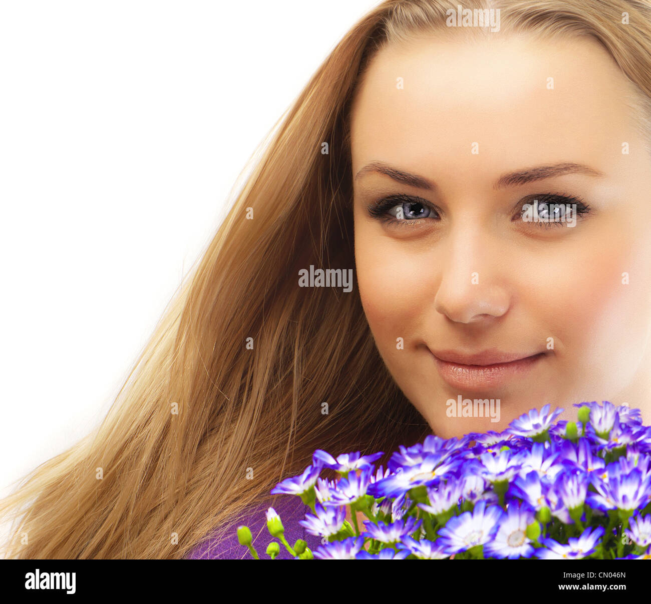 Beautiful female holding flowers, girl with bouquet of spring plant