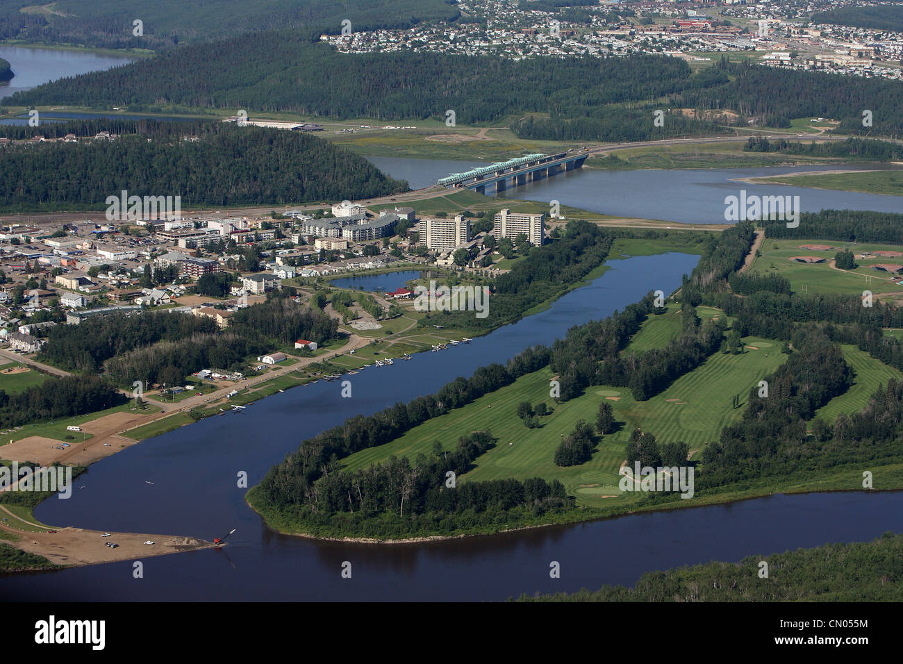 Fort McMurray, Alberta. Aerial view of the city with Athabaska River running through it Stock Fort McMurray, Alberta. Aerial view of the city with Athabaska River running through it Stock