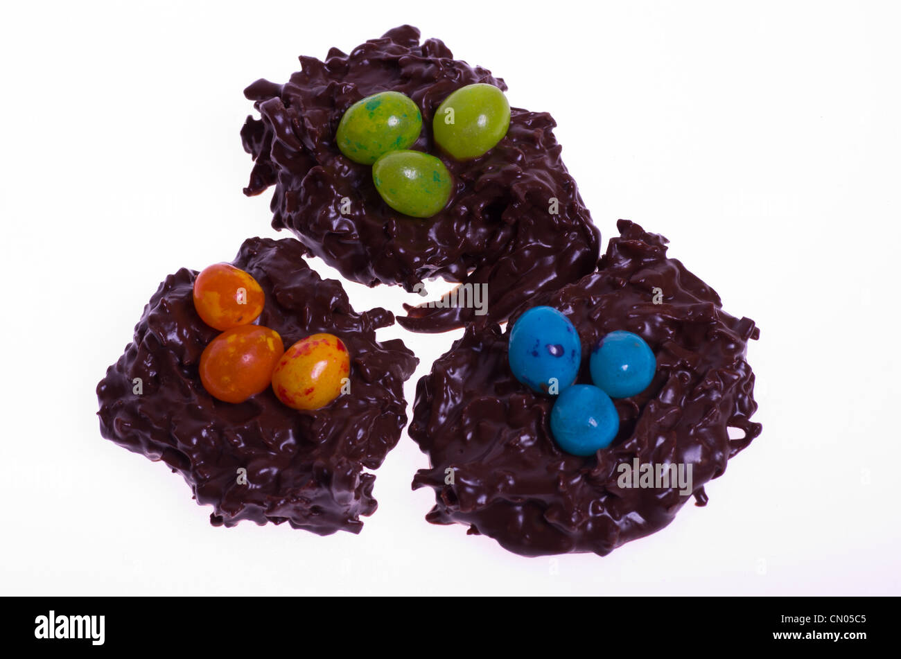 Three coconut candy bird nests with jelly beans Stock Photo Alamy