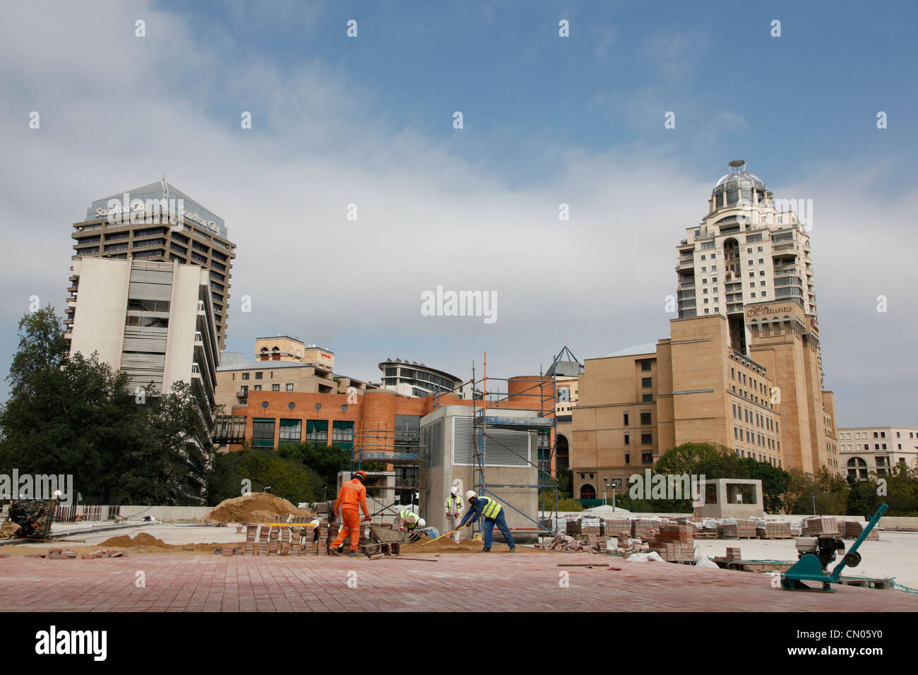 Construction of booming businesses in South Africa's richest area Sandton creates employment for many. South Africa Stock Photo