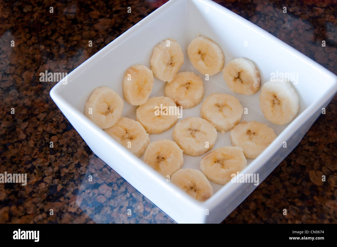 Making banana dessert Stock Photo - Alamy