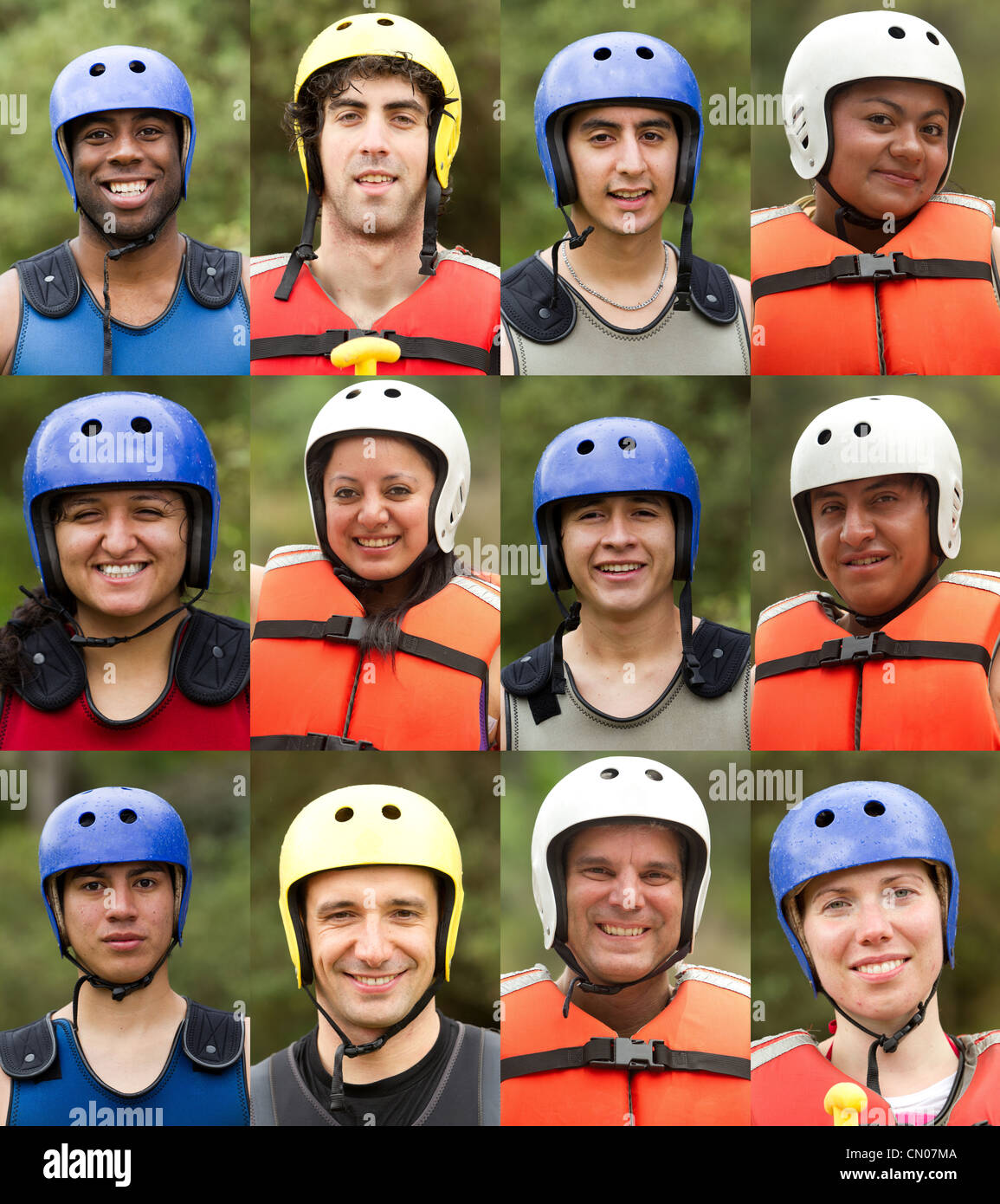 GROUP OF TWELVE YOUNG PEOPLE PRACTICING WATER SPORTS WEARING HELMETS ON GREEN NATURAL BACKGROUND Stock Photo