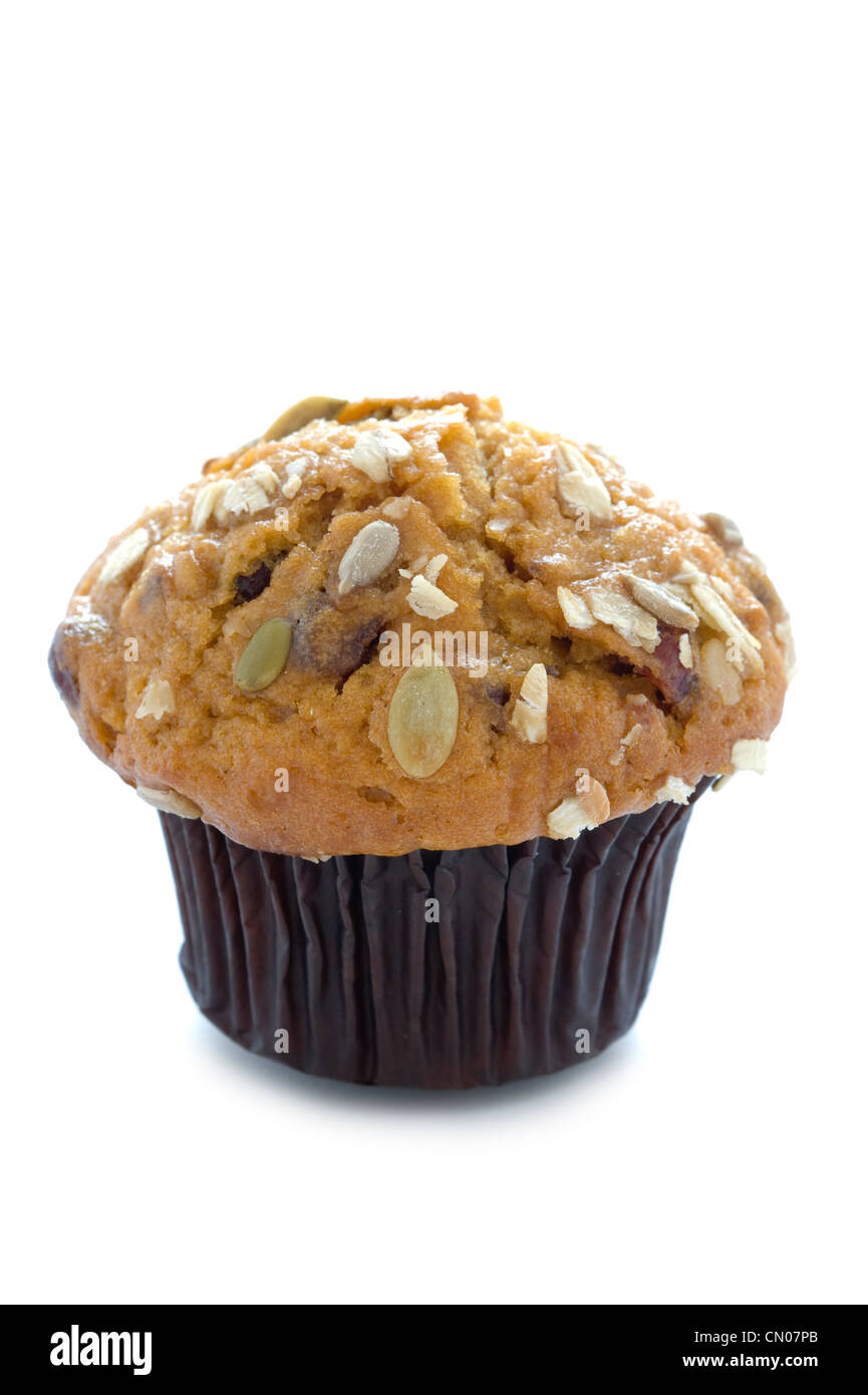 a healthy choice muffin with seeds and oats isolated on a white background Stock Photo