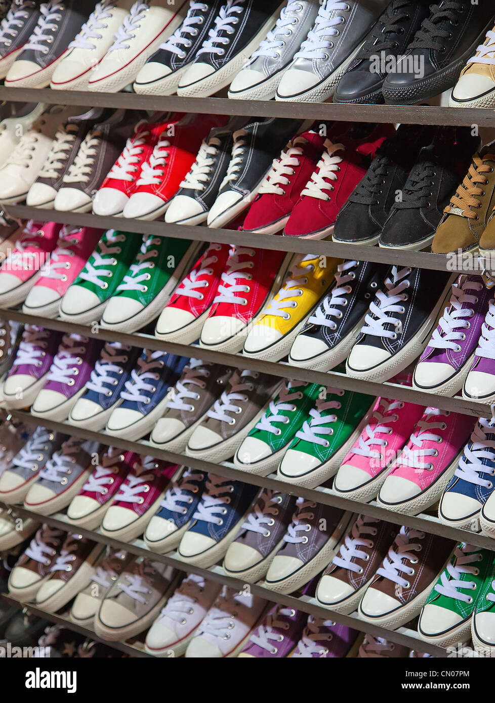 lots of sneaker shoes on sale on Hong Kong night market Stock Photo - Alamy