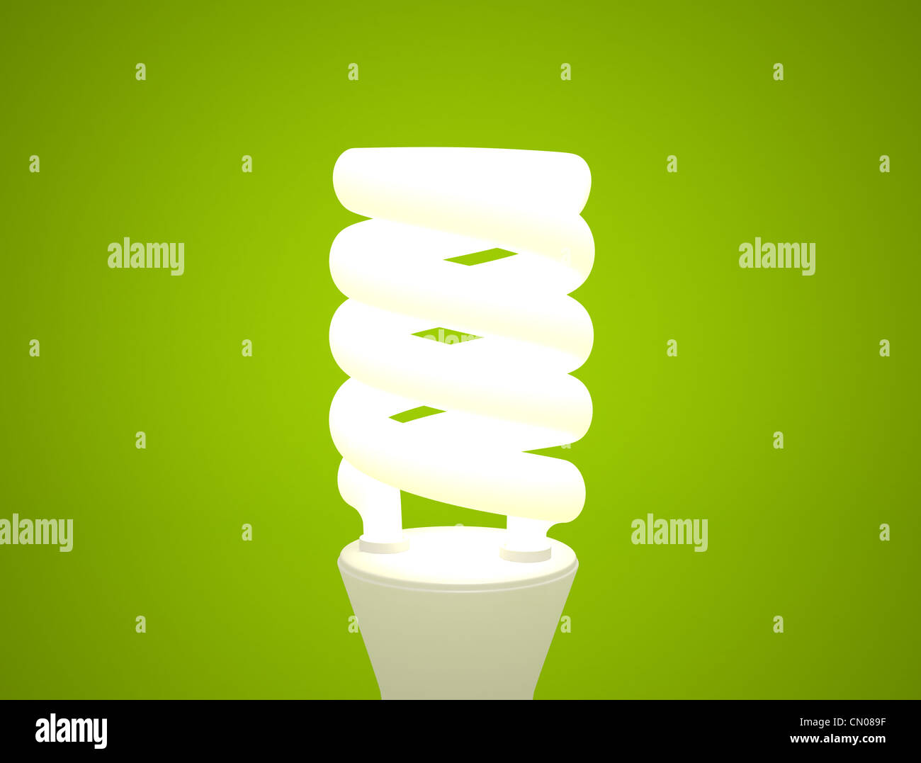 Energy efficient light bulb on green background Stock Photo - Alamy