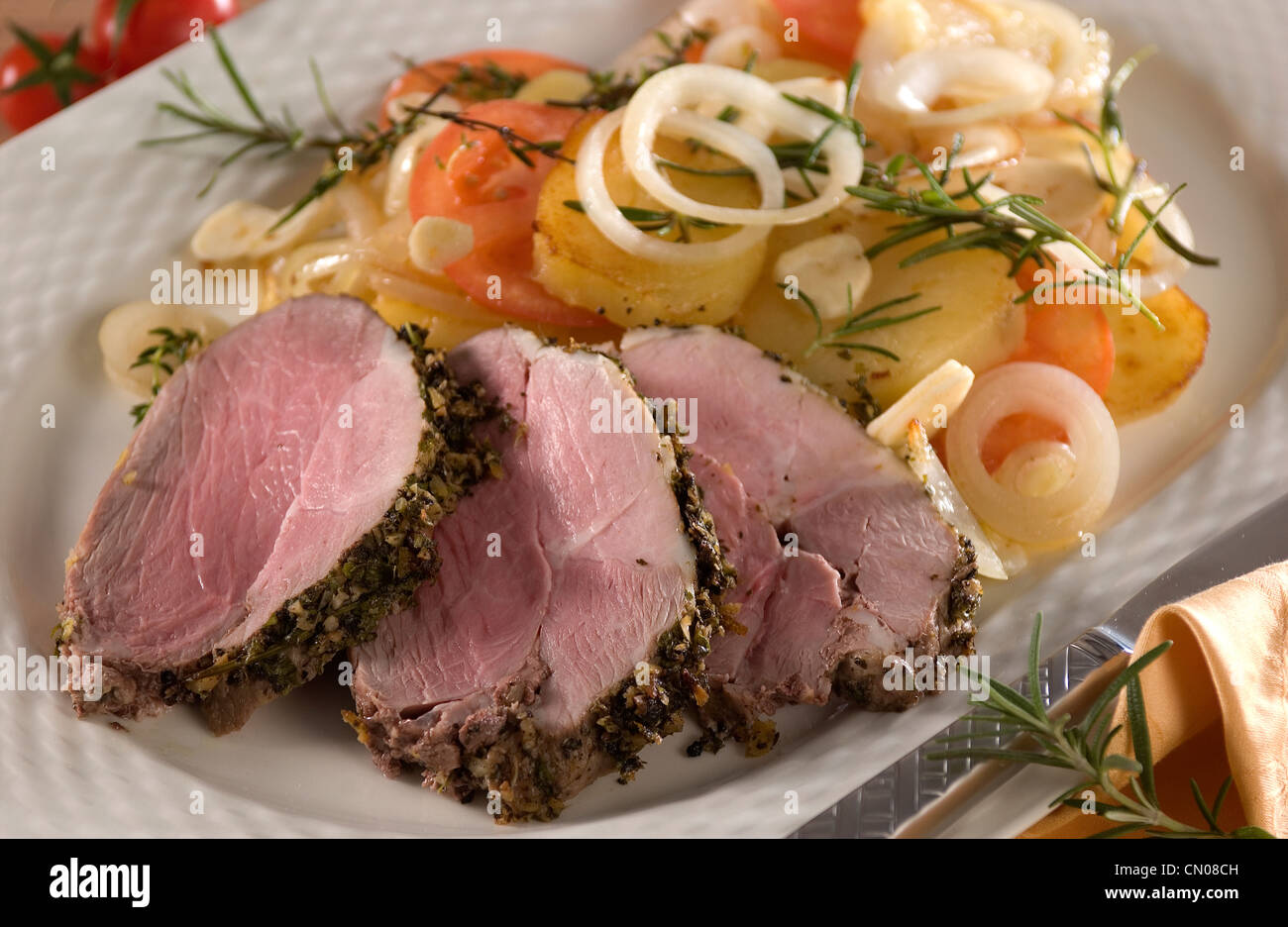 spicy lamb roast joint Stock Photo - Alamy
