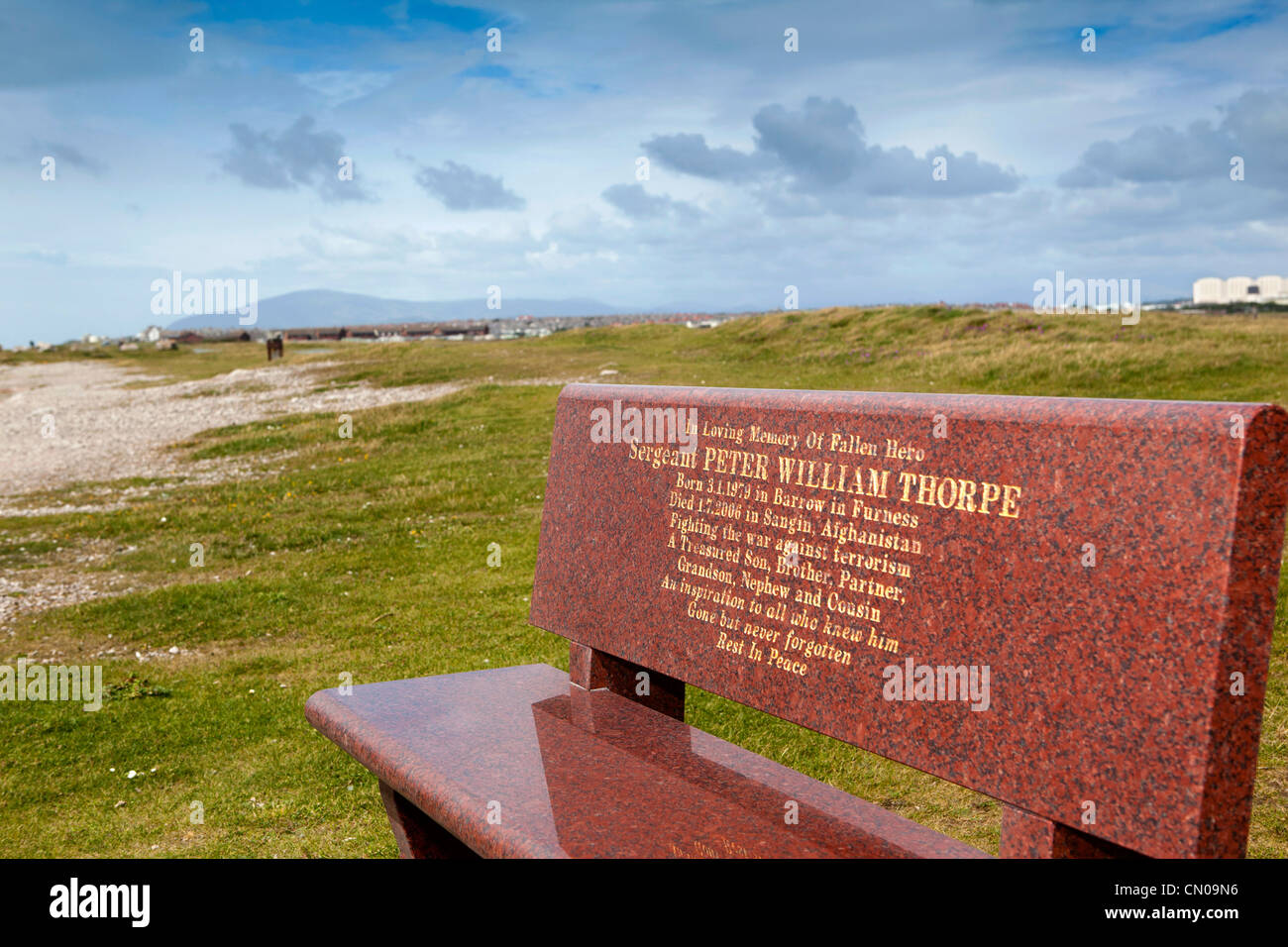 UK, Cumbria, Barrow in Furness, Walney Island, memorial bench to Sgt Peter Thorpe killed in Sangin Afghanistan Stock Photo