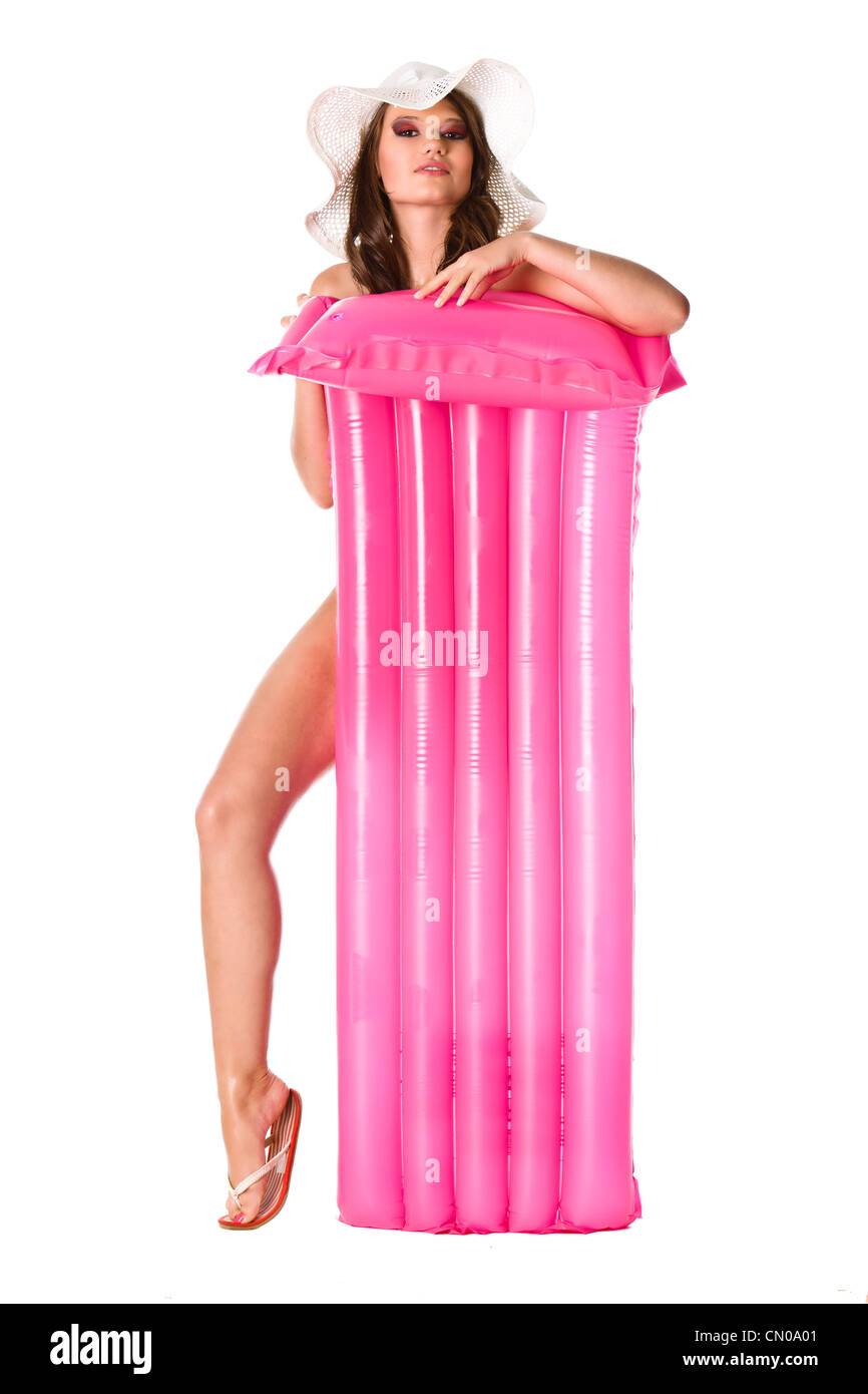 Beautiful Woman with pink mattress Stock Photo
