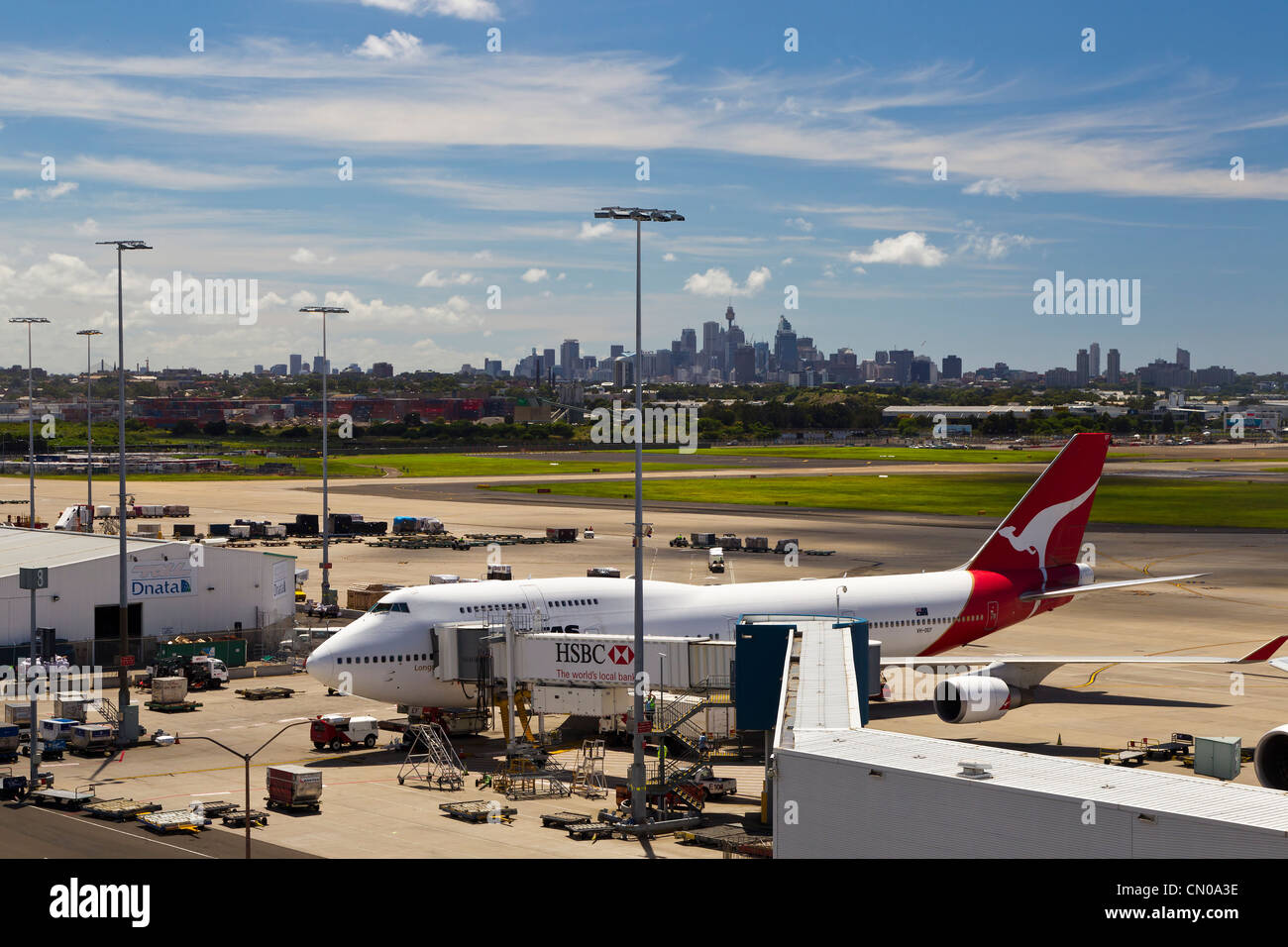 Sydney Airport with Qantas planes parked at end of walkway Stock Photo