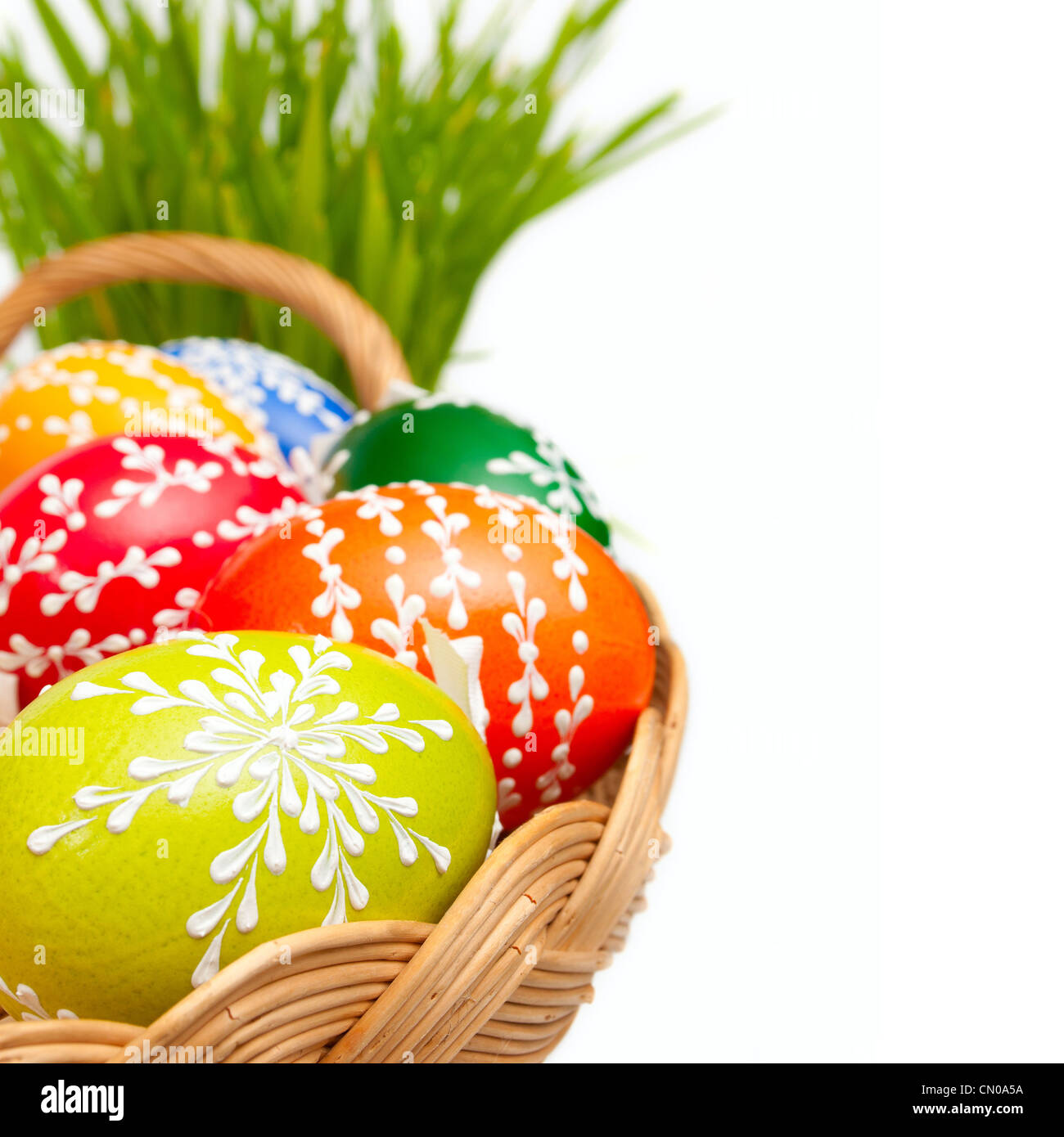 Easter Hand Painted Eggs in Basket and Grass Isolated on White Stock ...