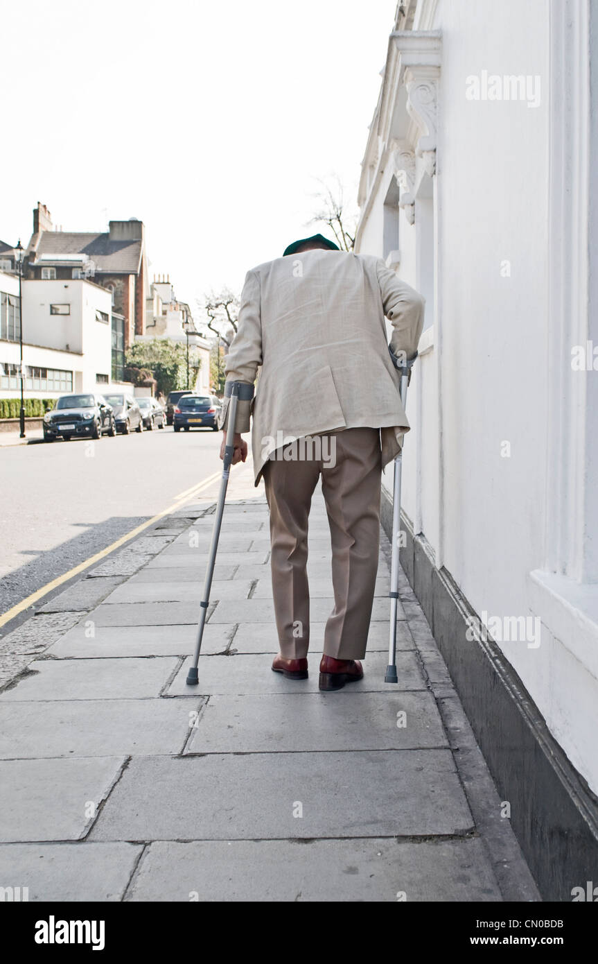 Man bent over walking hi-res stock photography and images - Alamy