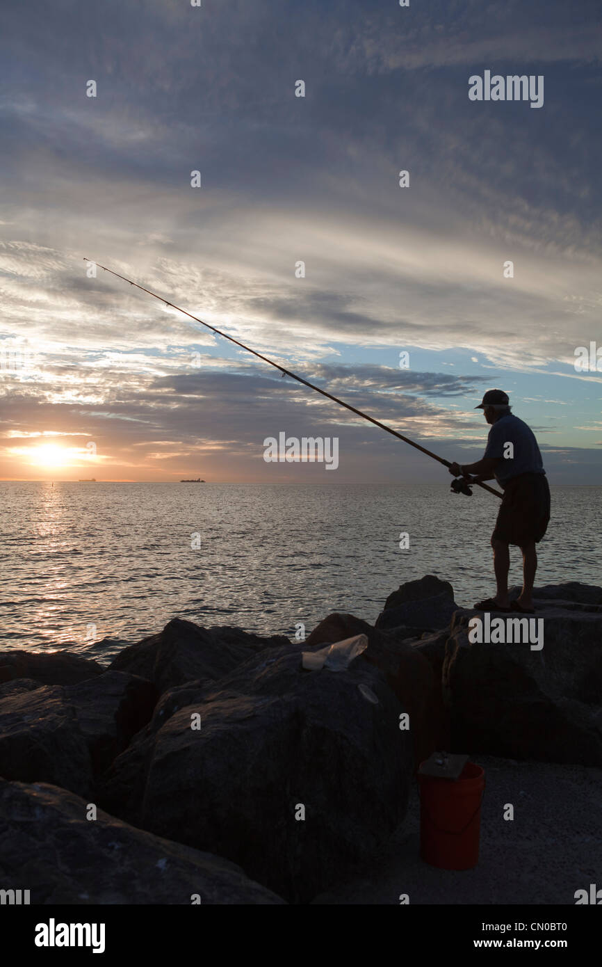 A man fishing at City Beach, Perth, Western Australia Stock Photo Alamy