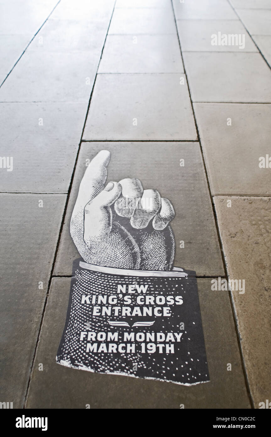 Kings Cross Reeption Sign A 'New Kings Cross Entrance' floor sign Stock Photo - Alamy