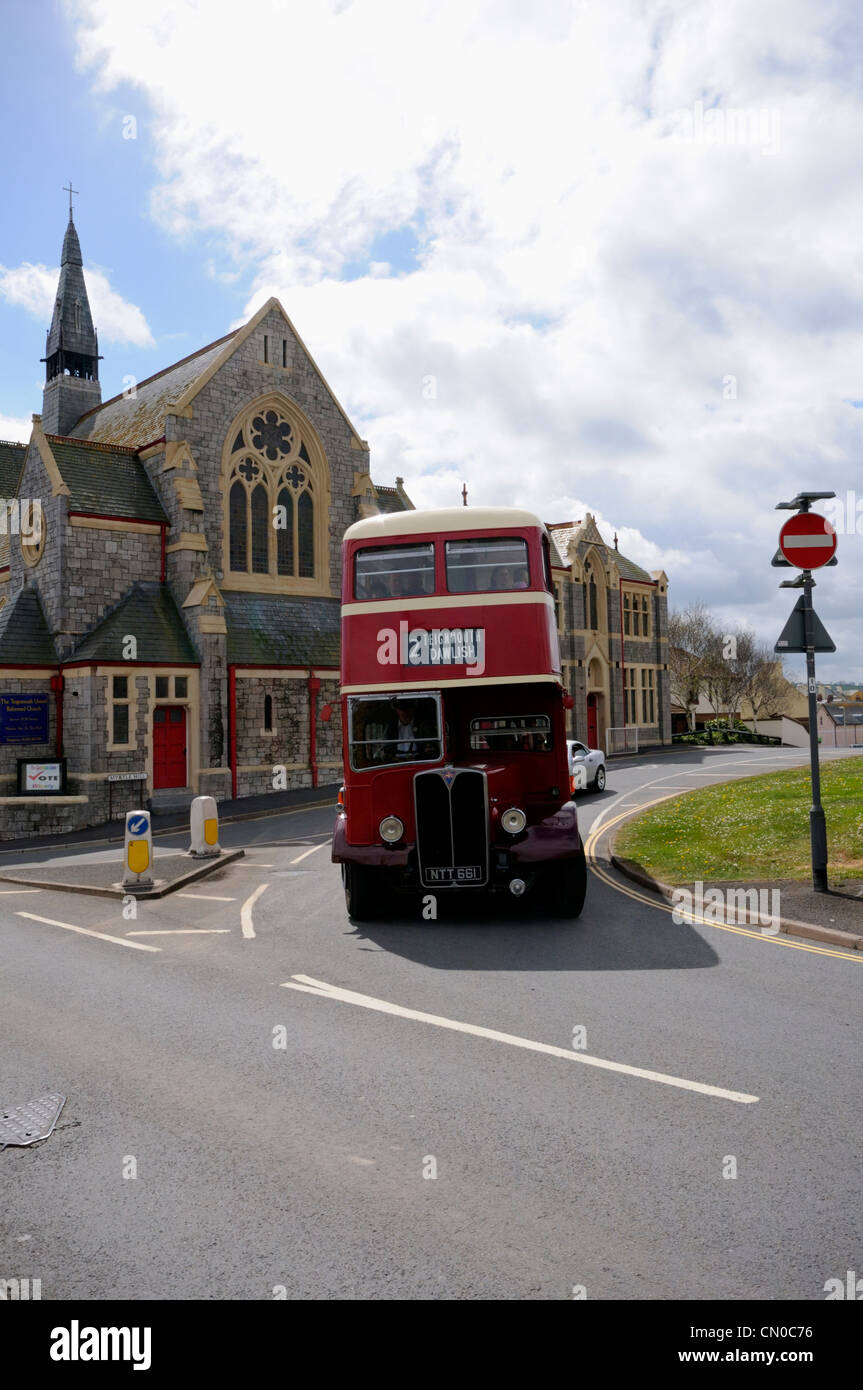 Classic Devon General Double Decker Bus travelling through Teignmouth in Devon Stock Photo