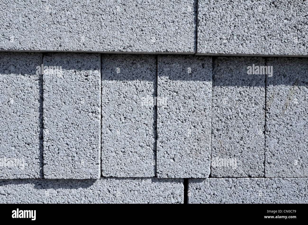 Close detail of stacked concrete building blocks on construction site ...