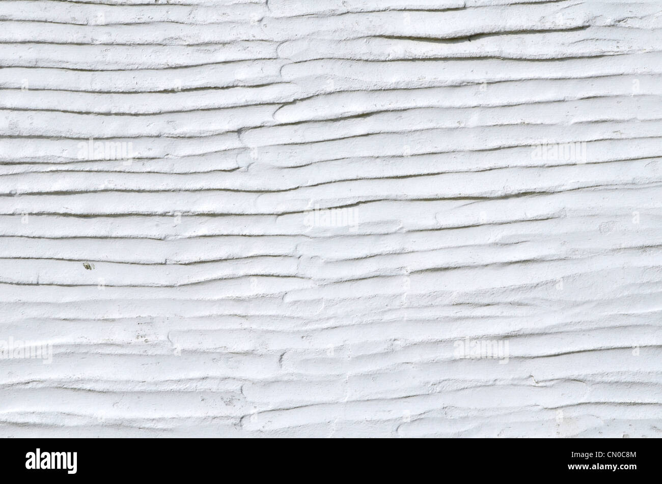 Whitewashed rendered external cement wall. Blank outdoor wall. Rough