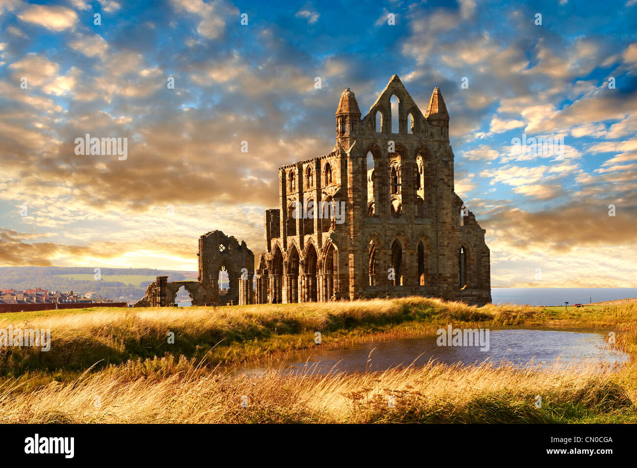 Medieval Gothic Whitby Abbey at sunset, Whitby, North Yrokshire, England Stock Photo