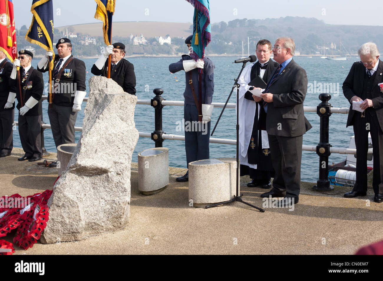 James Penrose reads a poem at the St Nazaire Memorial Stock Photo Alamy