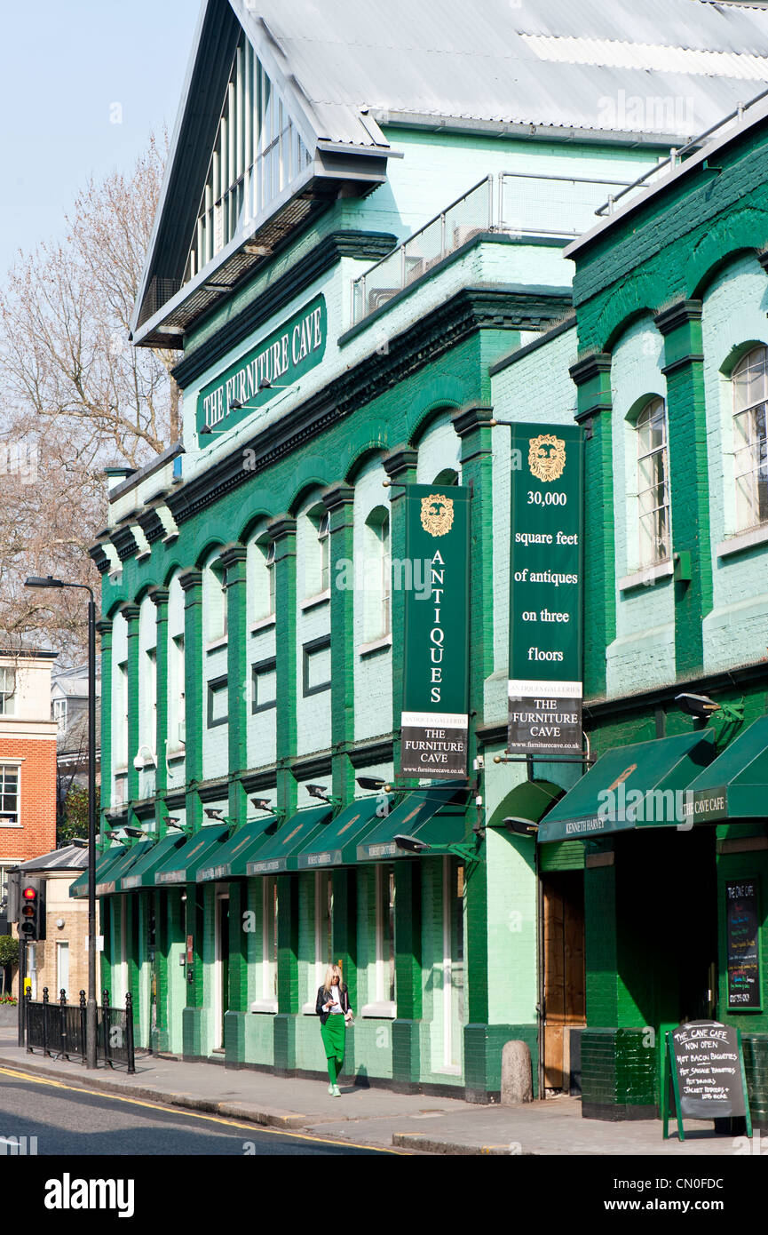 'The Futniture Cave' Antique furniture shop on Lots Road, SW10, Chelsea, London, United Kingdom Stock Photo