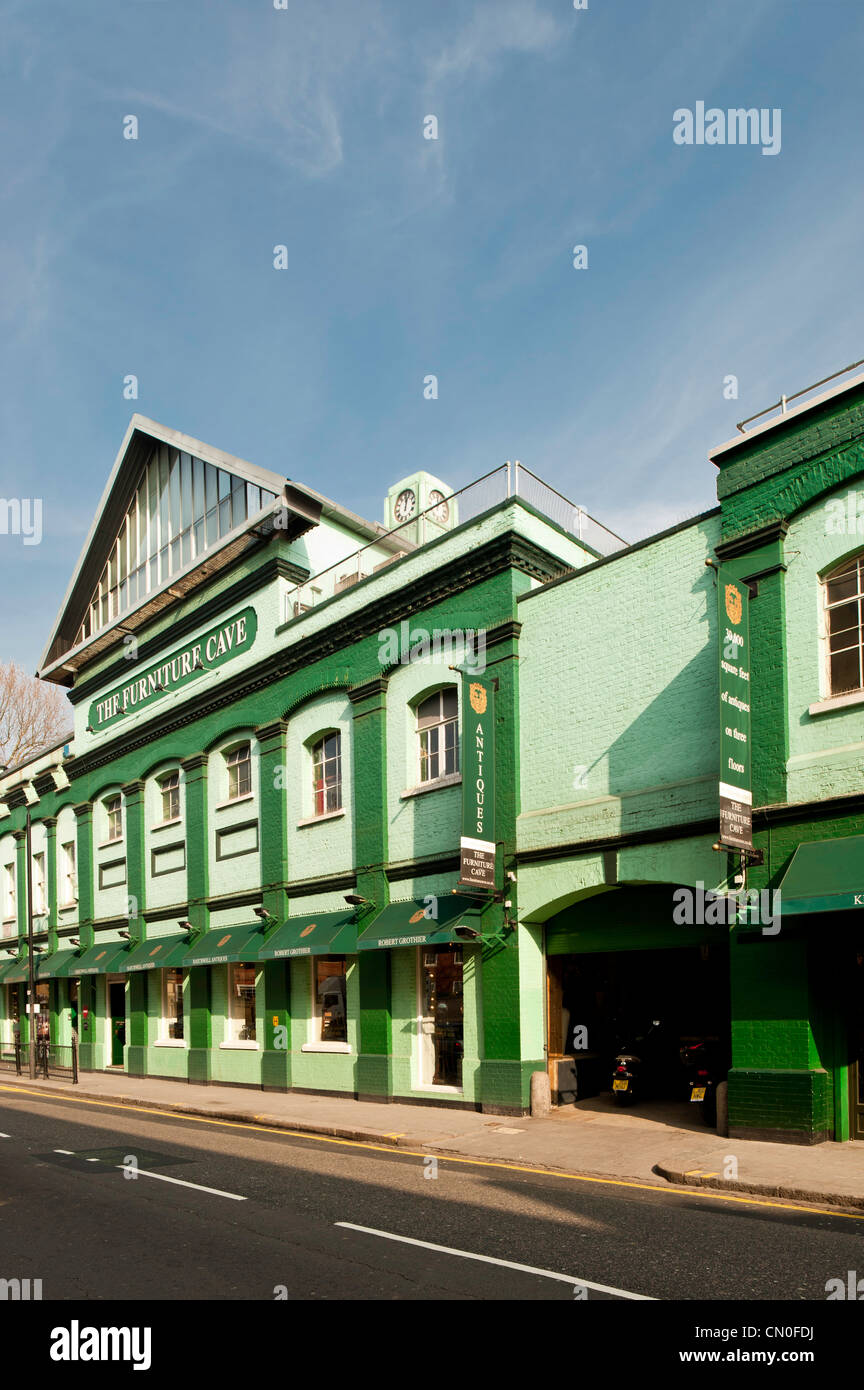 'The Futniture Cave' Antique furniture shop on Lots Road, SW10, Chelsea, London, United Kingdom Stock Photo