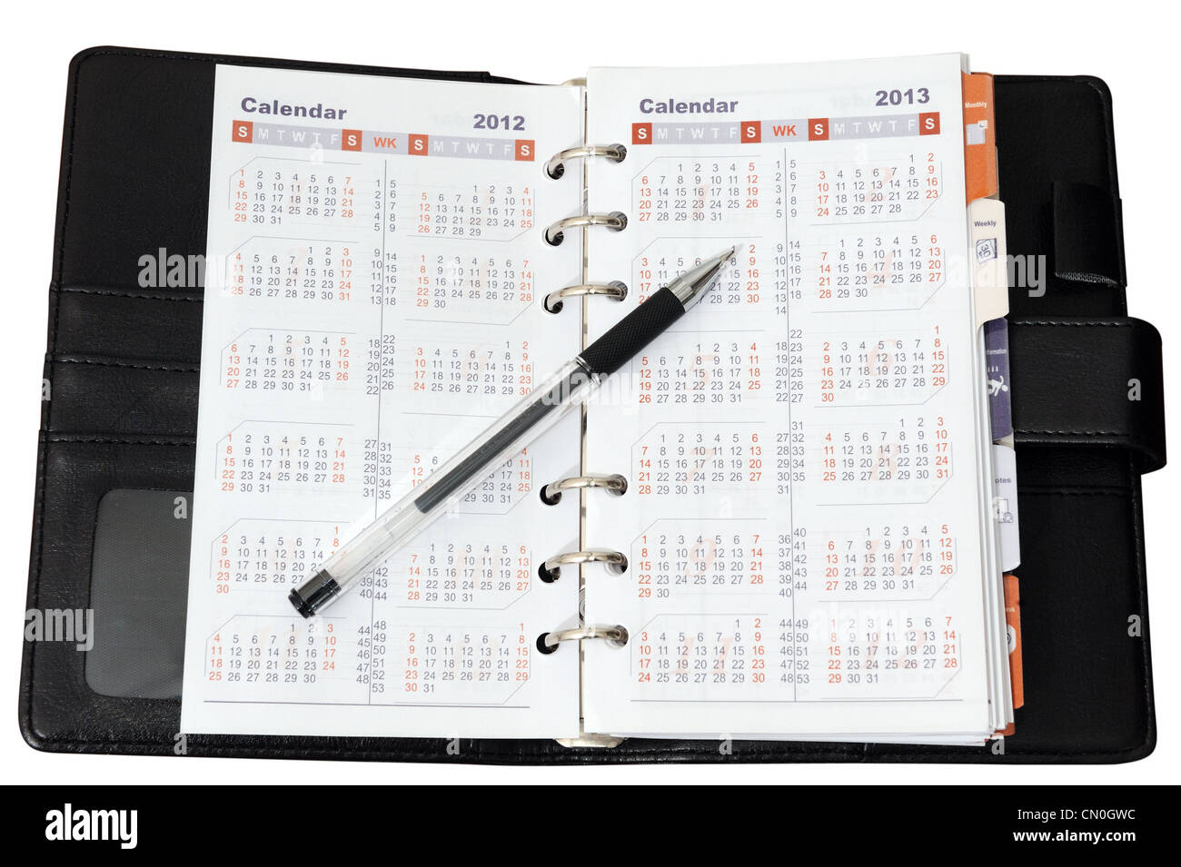Calendar in notebook with a pen on it Stock Photo