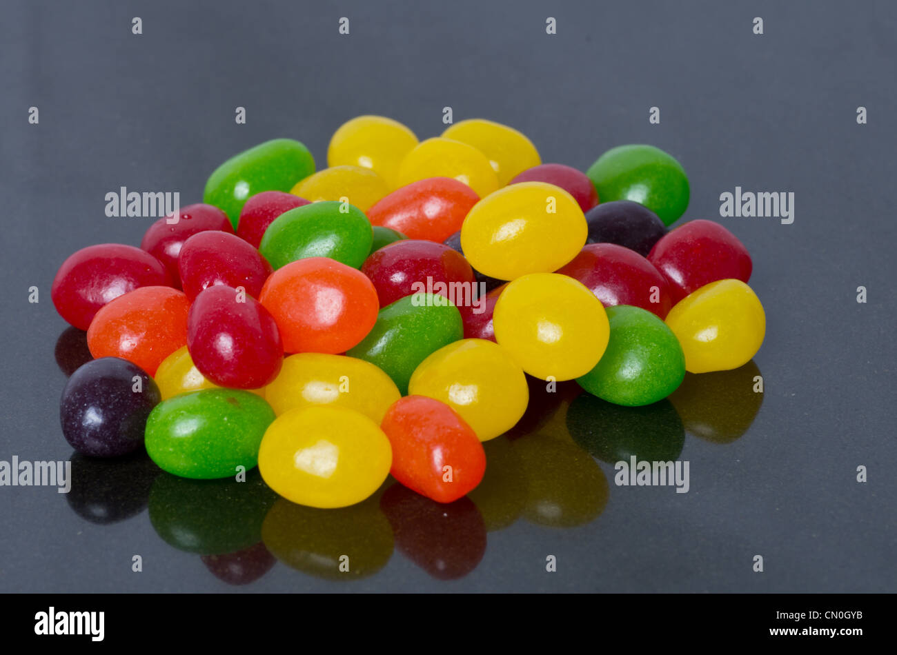 An arrangement of jelly beans on black Stock Photo Alamy