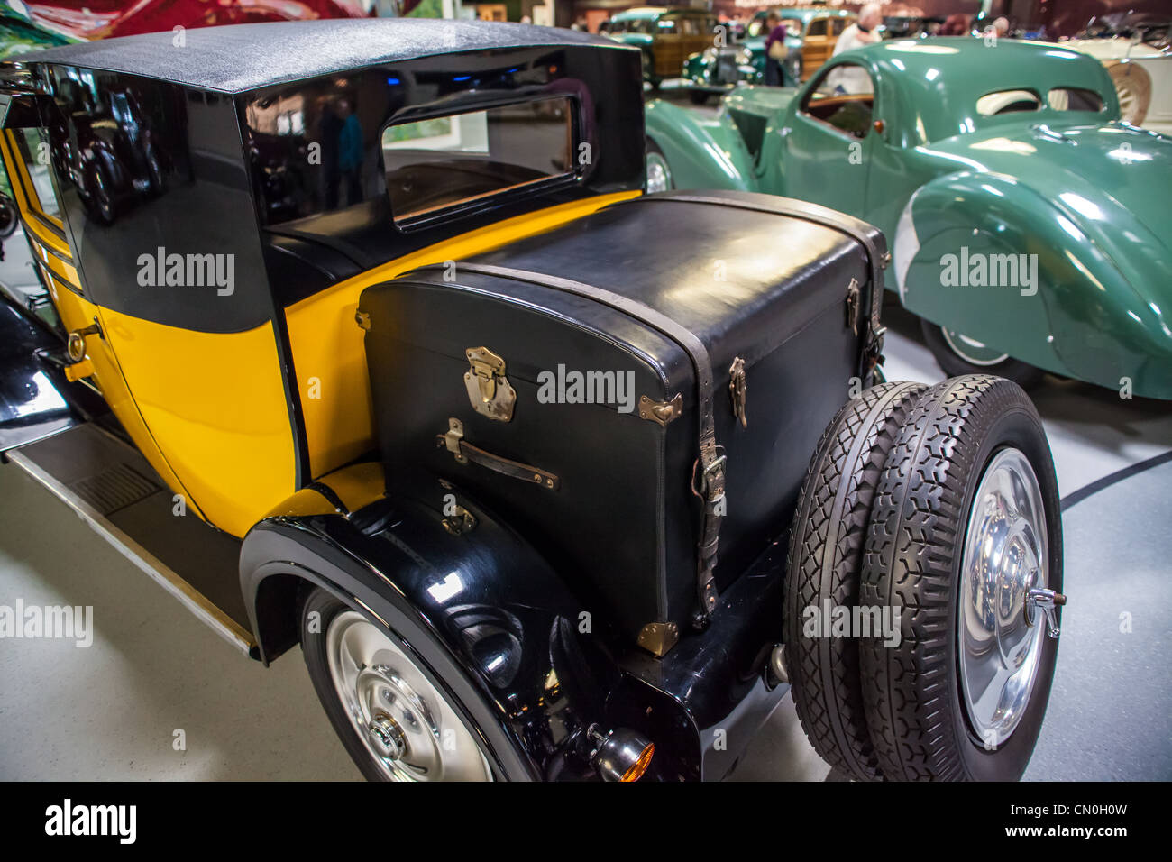 A trunk and Spare tire carrier on an antique automobile Stock Photo - Alamy