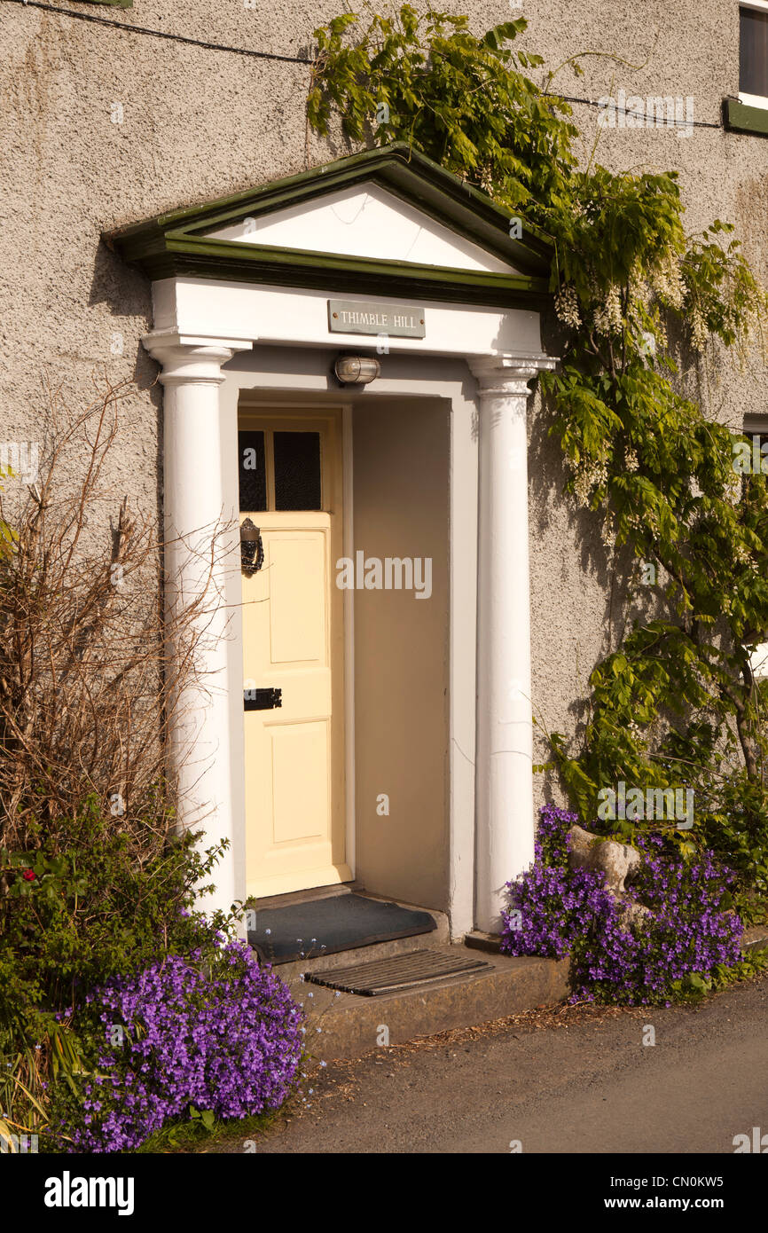 UK, Cumbria, Cartmel very small front garden of Thimble Hill, house with front door straight onto road Stock Photo