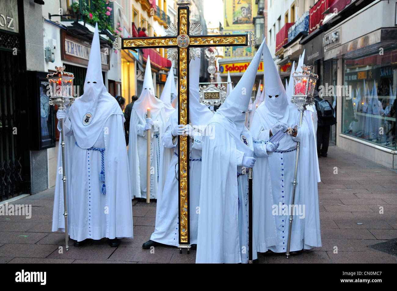 Spain Seville Semana Santa Holy Week Easter Nazarenos or members of the  Resurreccion Brotherhood Stock Photo - Alamy