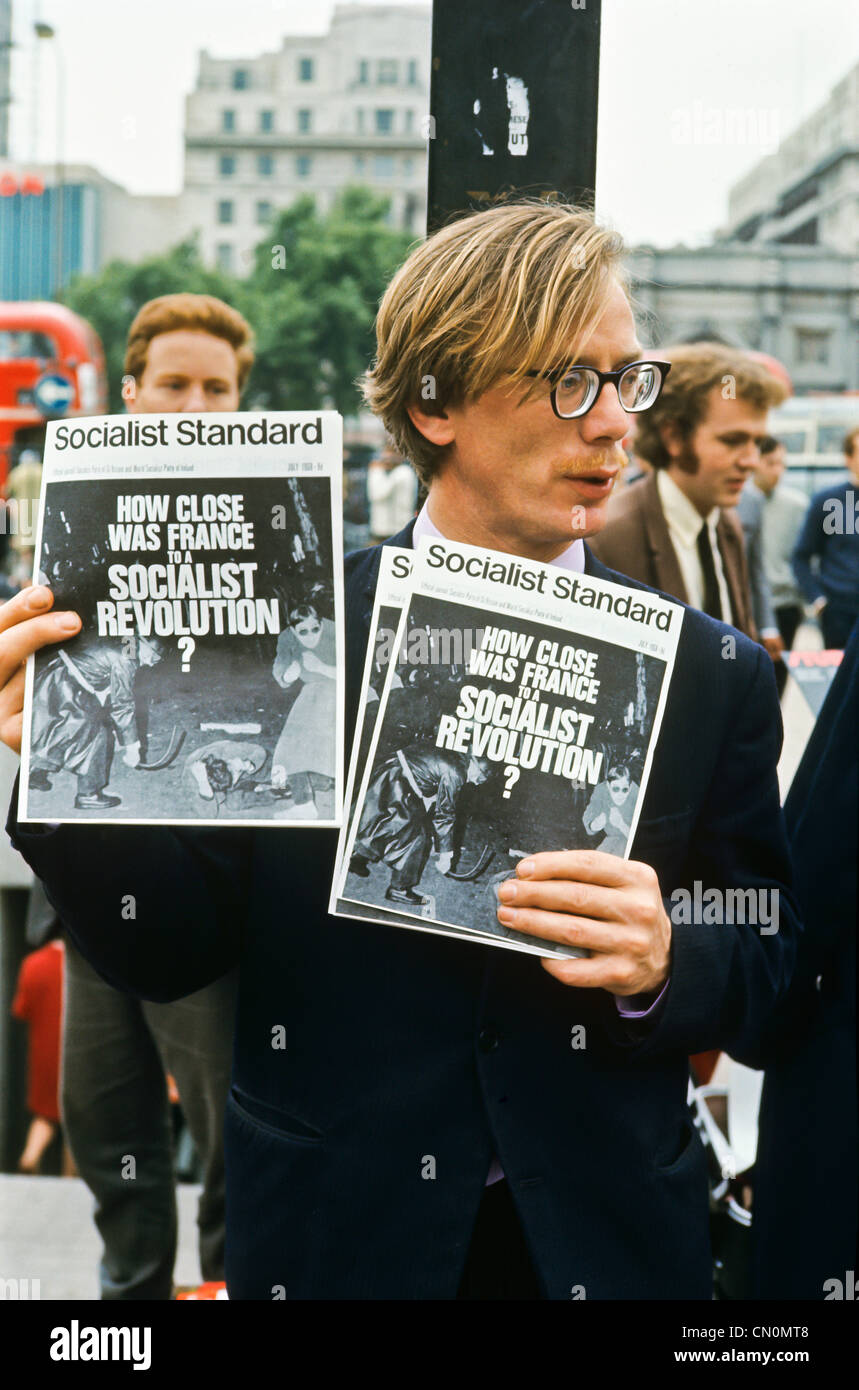 July 1968,Socialist Standard newspaper street seller,vintage image, London,UK,Great-Britain, May 1968 French riot,France socialism revolution, 1960s, Stock Photo