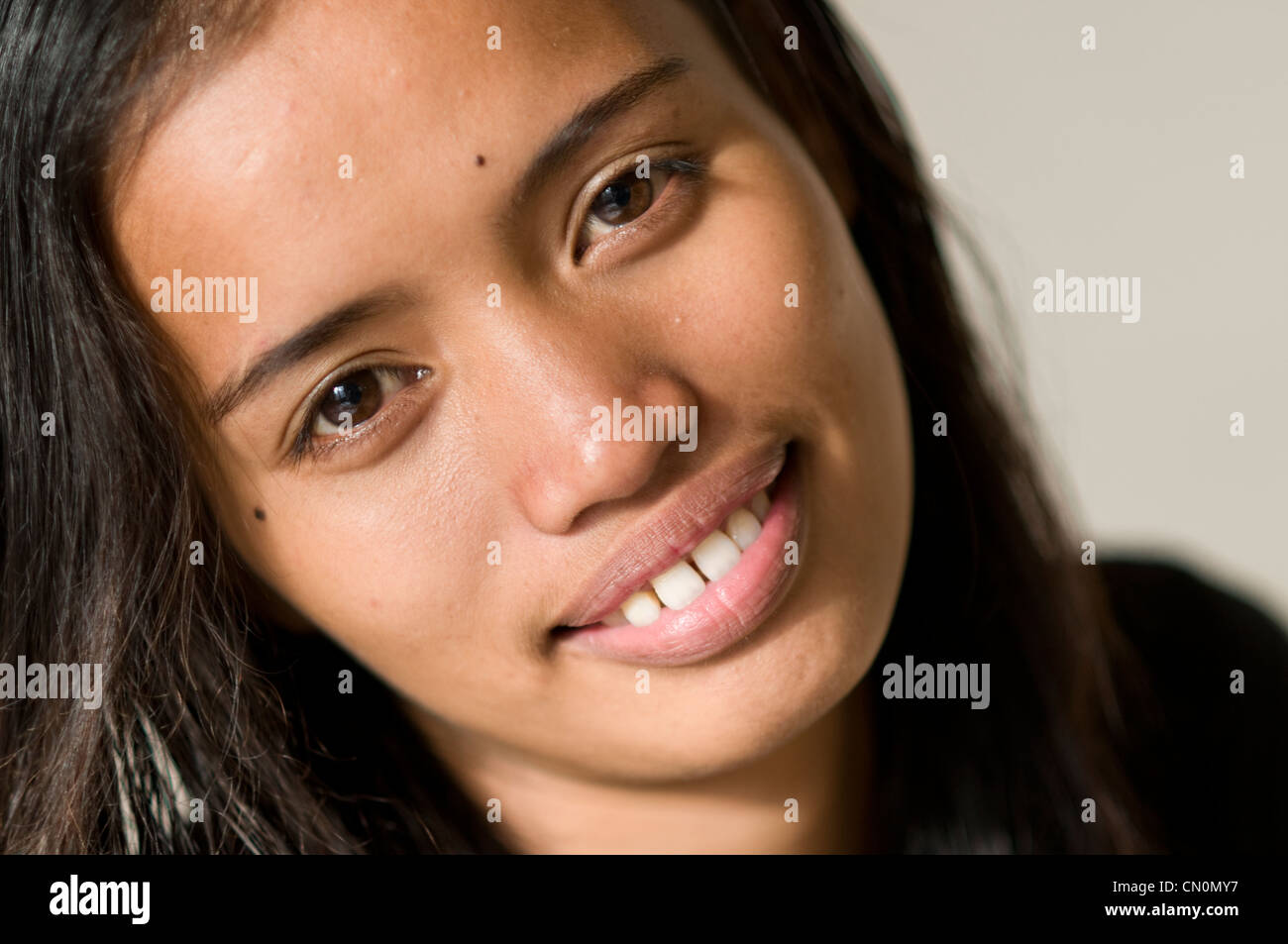 portrait of a young Asian woman Stock Photo - Alamy