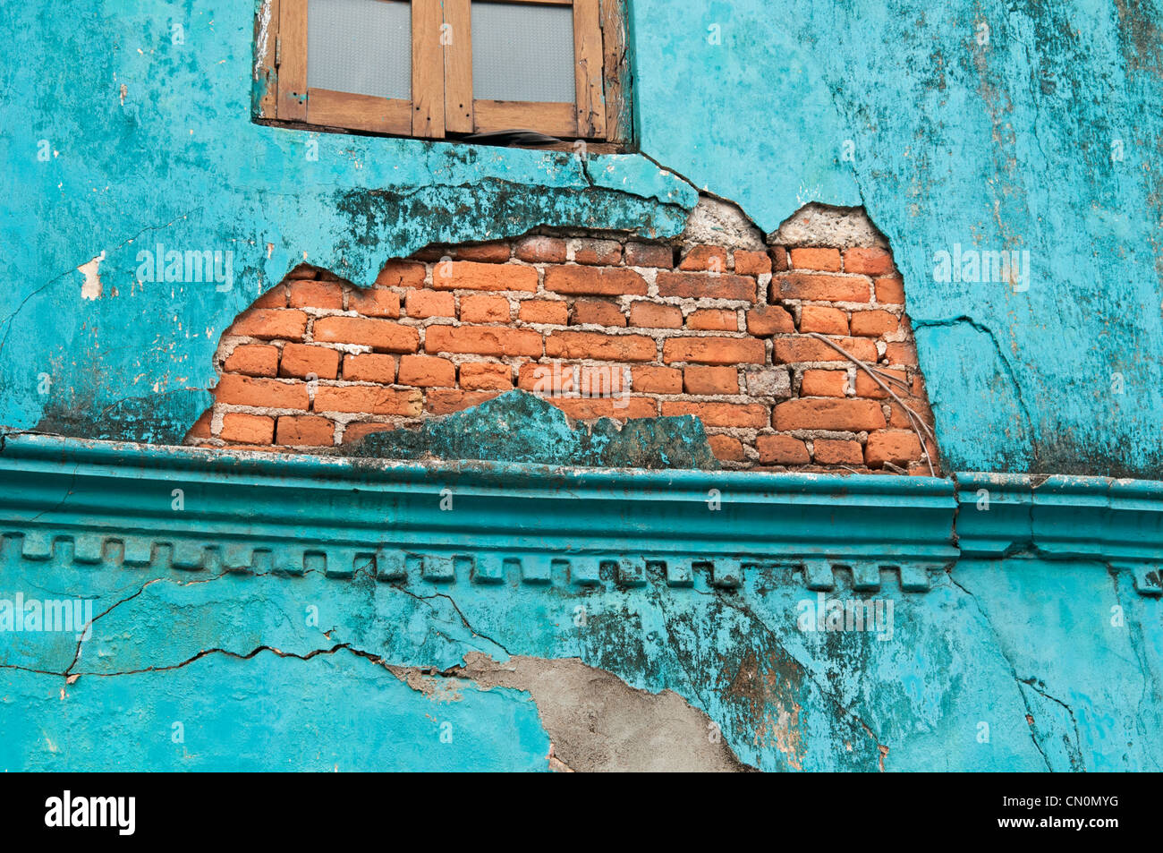 Detail of peeling painted decrepit wall in New Galle Sri Lanka Stock Photo