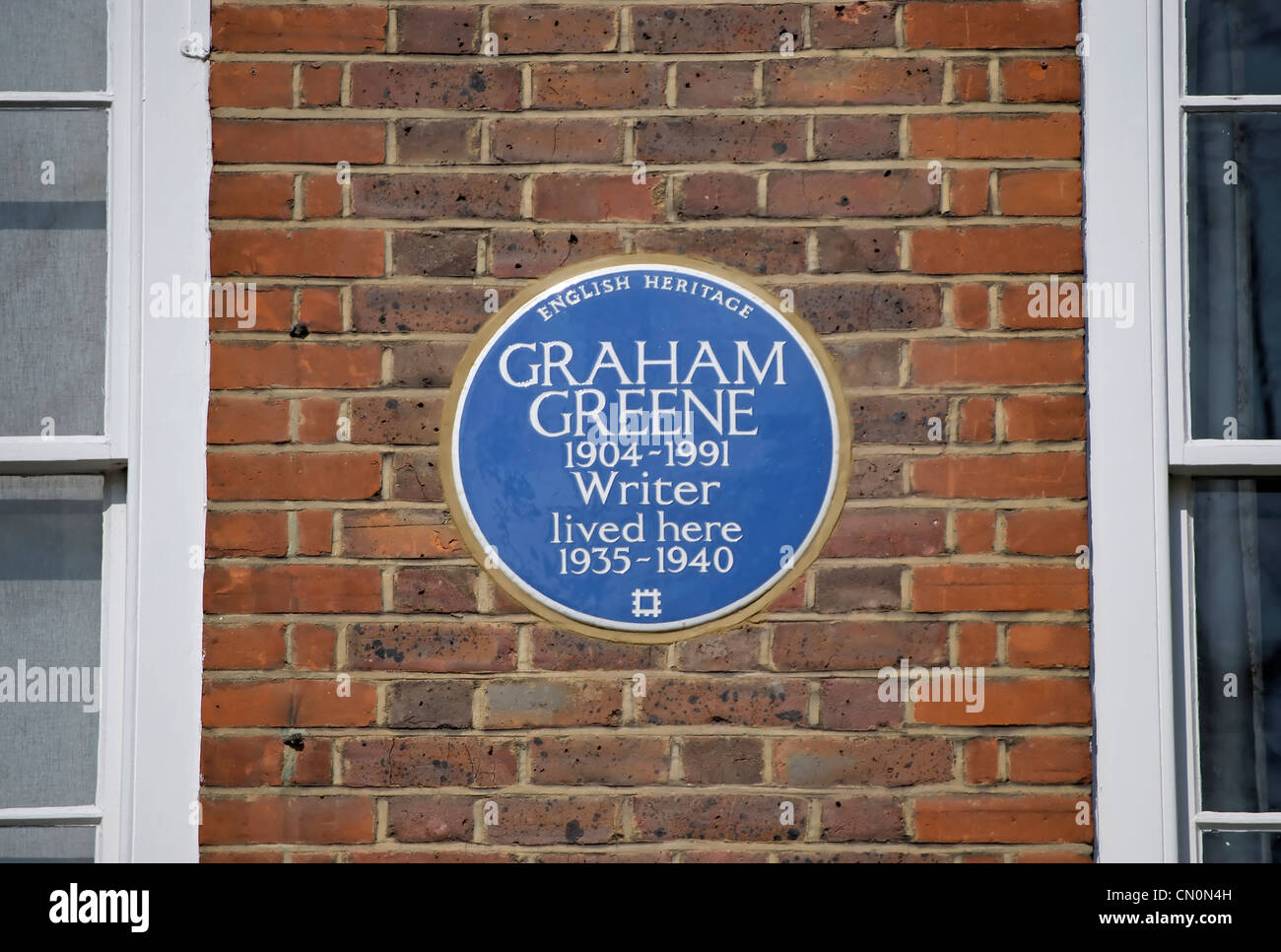 english heritage blue plaque marking a home of novelist graham greene, clapham,  london, england Stock Photo